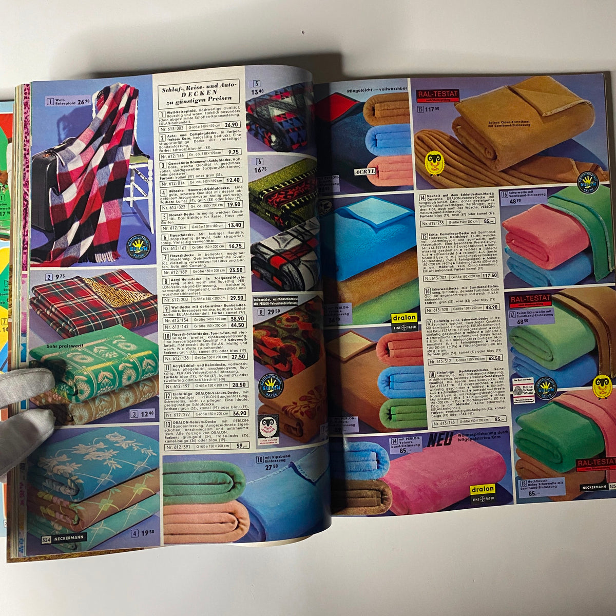 Image from the 1968 Neckermann Sommer Catalog featuring a variety of blankets and home goods, showcasing the textile options available in late-1960s Germany.