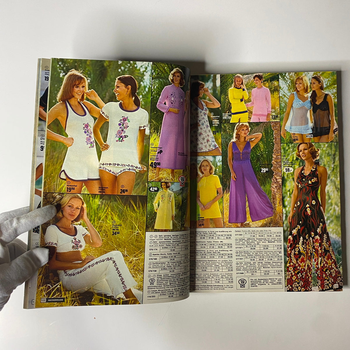 1974 Neckermann Sommer Catalog display of casual summer wear, including swimwear, dresses, and outfits, highlighted by models in a tropical setting.
