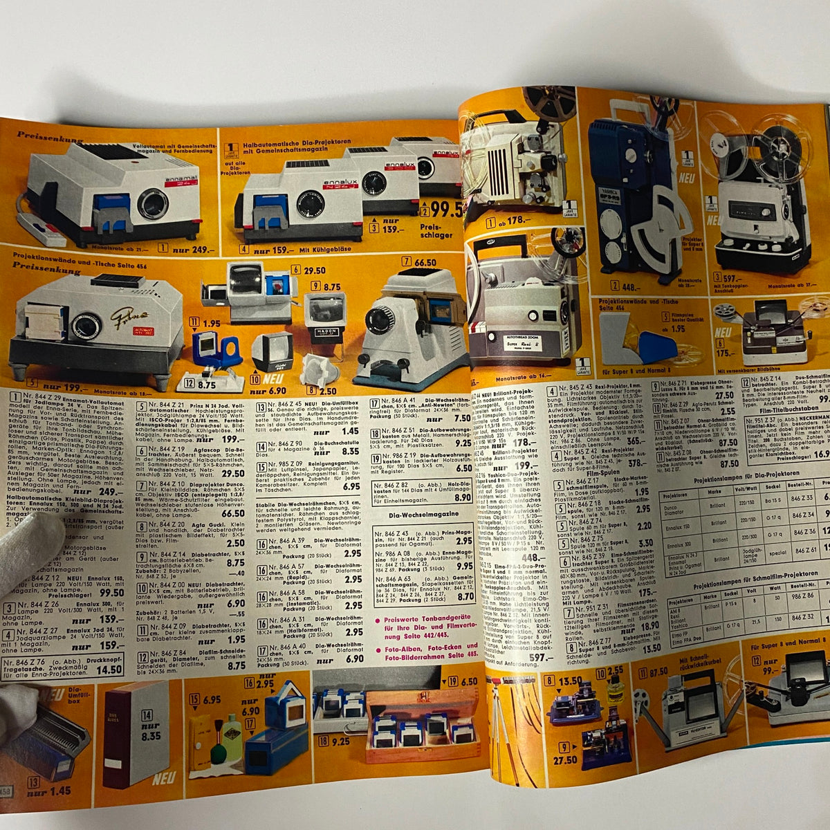 1967 Neckermann Sommer Catalog page with vintage photography of projectors and cameras, illustrating household technology and gadgets from the 1960s.