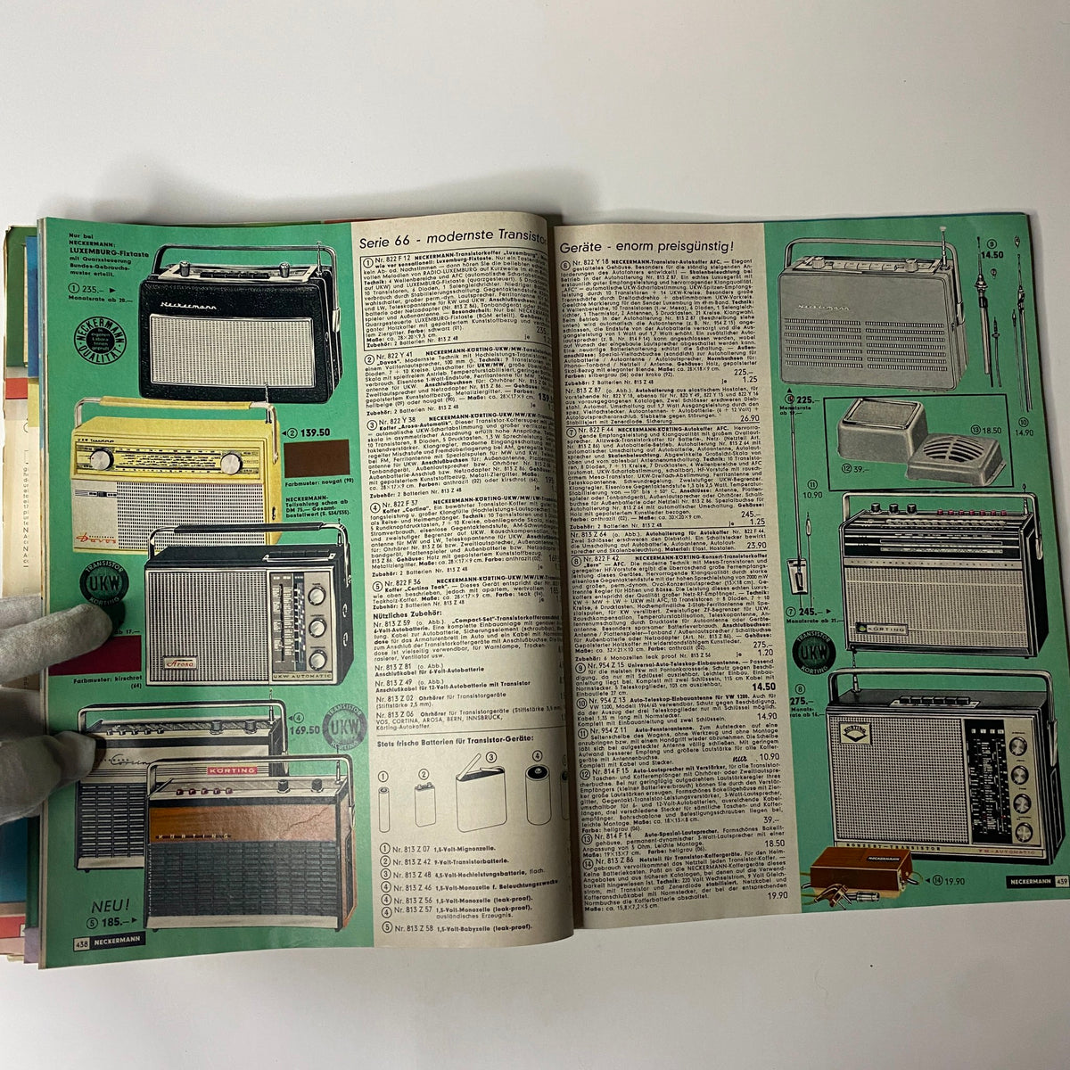 1965-1966 Neckermann Winter Catalog showcasing various vintage radios and audio equipment with product descriptions on vibrant green background.
