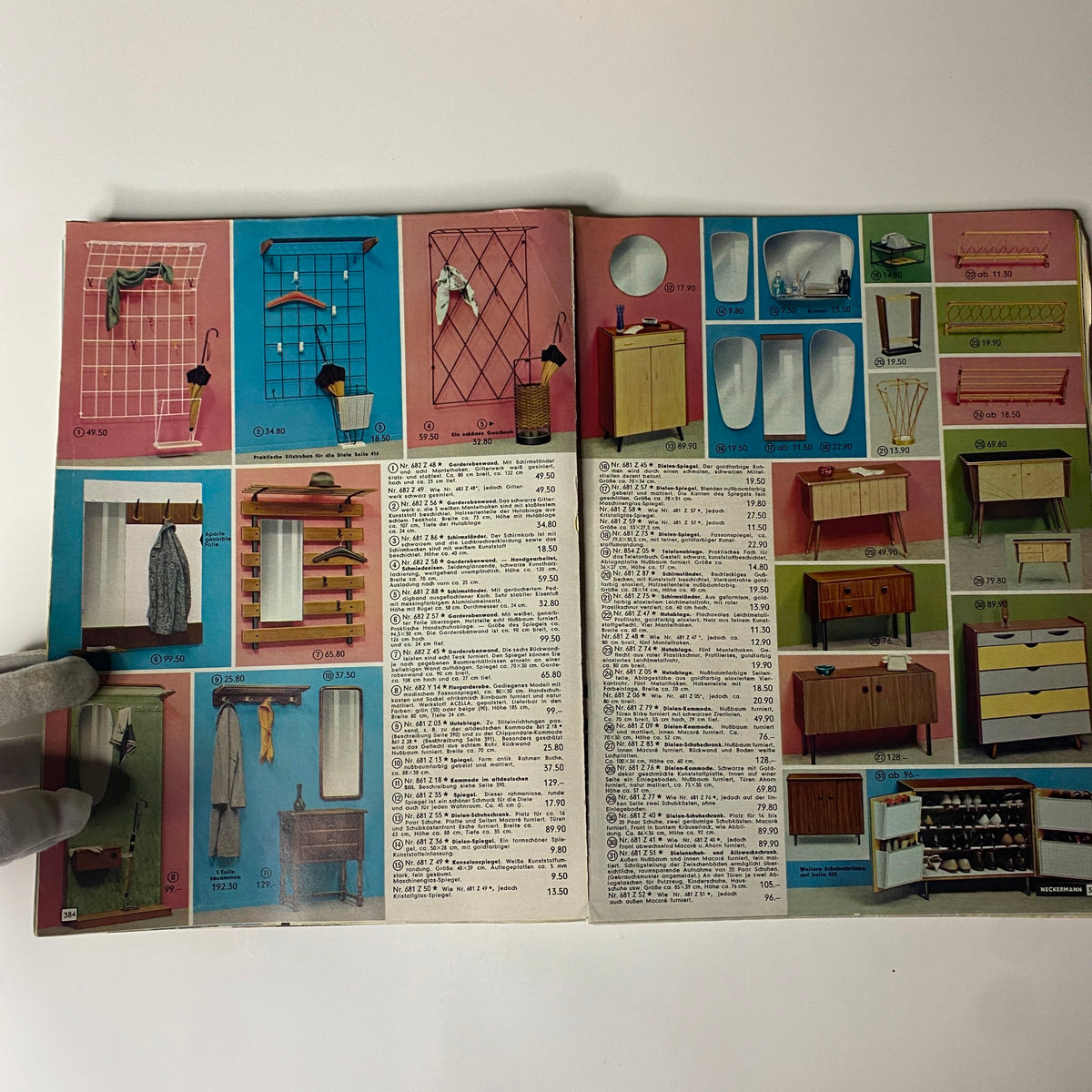 1965-1966 Neckermann Winter Catalog featuring mid-century modern furniture items including coat racks, mirrors, and storage solutions, displayed in pastel colors.