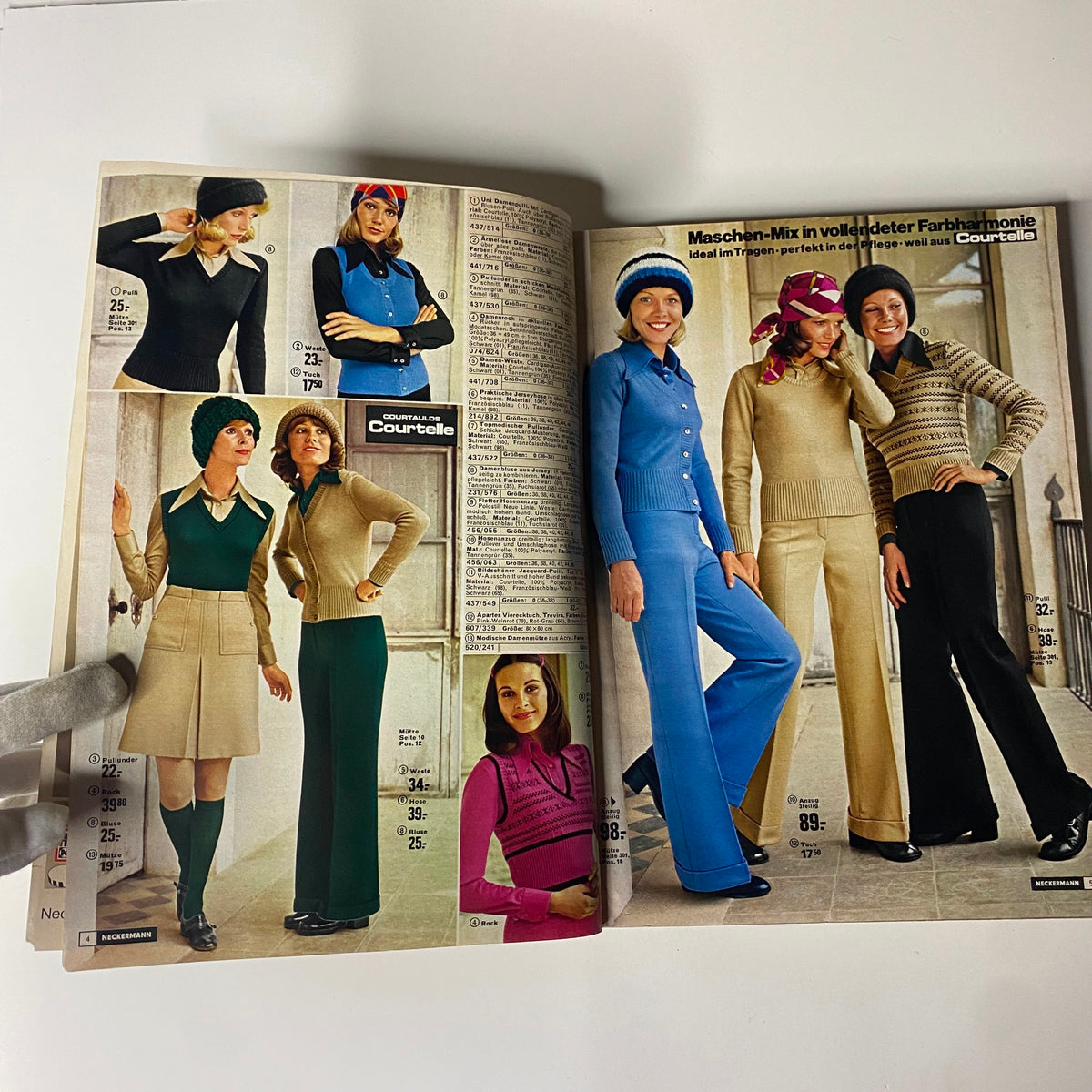 Inside pages of the 1973-1974 Neckermann Winter Catalog displaying various women's fashion styles, including sweaters and outfits, representative of 1970s fashion trends.