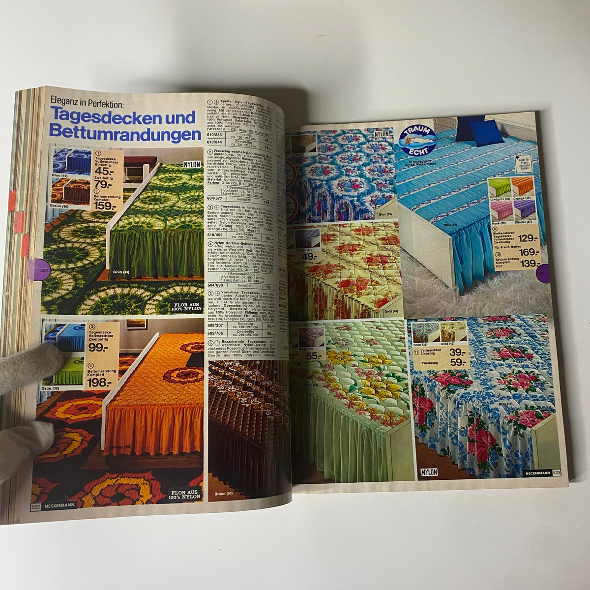 1977-1978 Neckermann Winter Catalog featuring bedroom decor items, displaying a selection of colorful bedspreads and decorative quilts from the late 1970s.