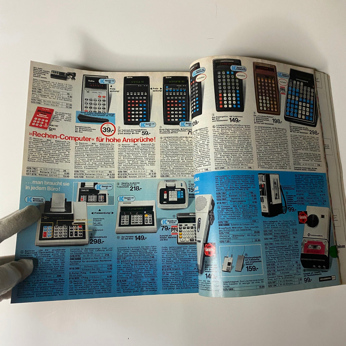 1977-1978 Neckermann Winter Catalog showcasing various calculators and office products on an open page, highlighting unique vintage technology offerings from late-1970s Germany.