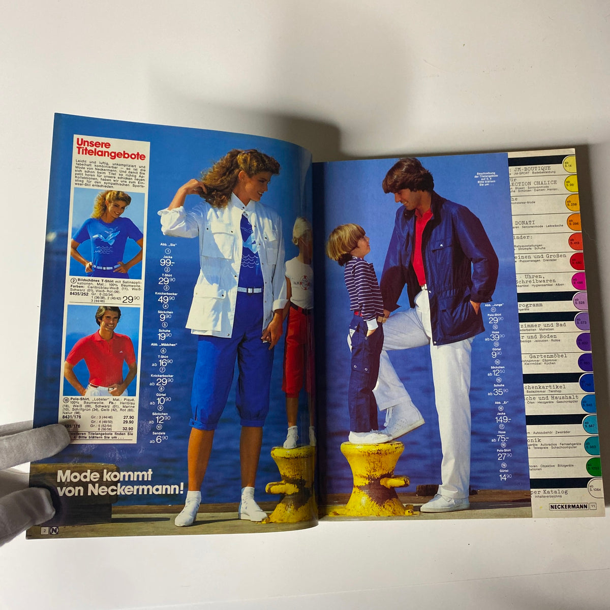 Inside spread of the 1982 Neckermann Summer Catalog displaying summer outfit selections on models, highlighting colorful clothing and accessories popular in the early 1980s.