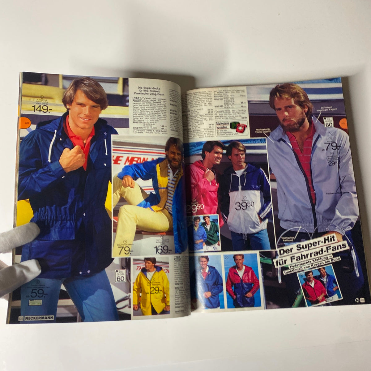 1982 Neckermann Summer Catalog highlighting clothing for men, featuring sporty jackets and casual wear, displayed on models.