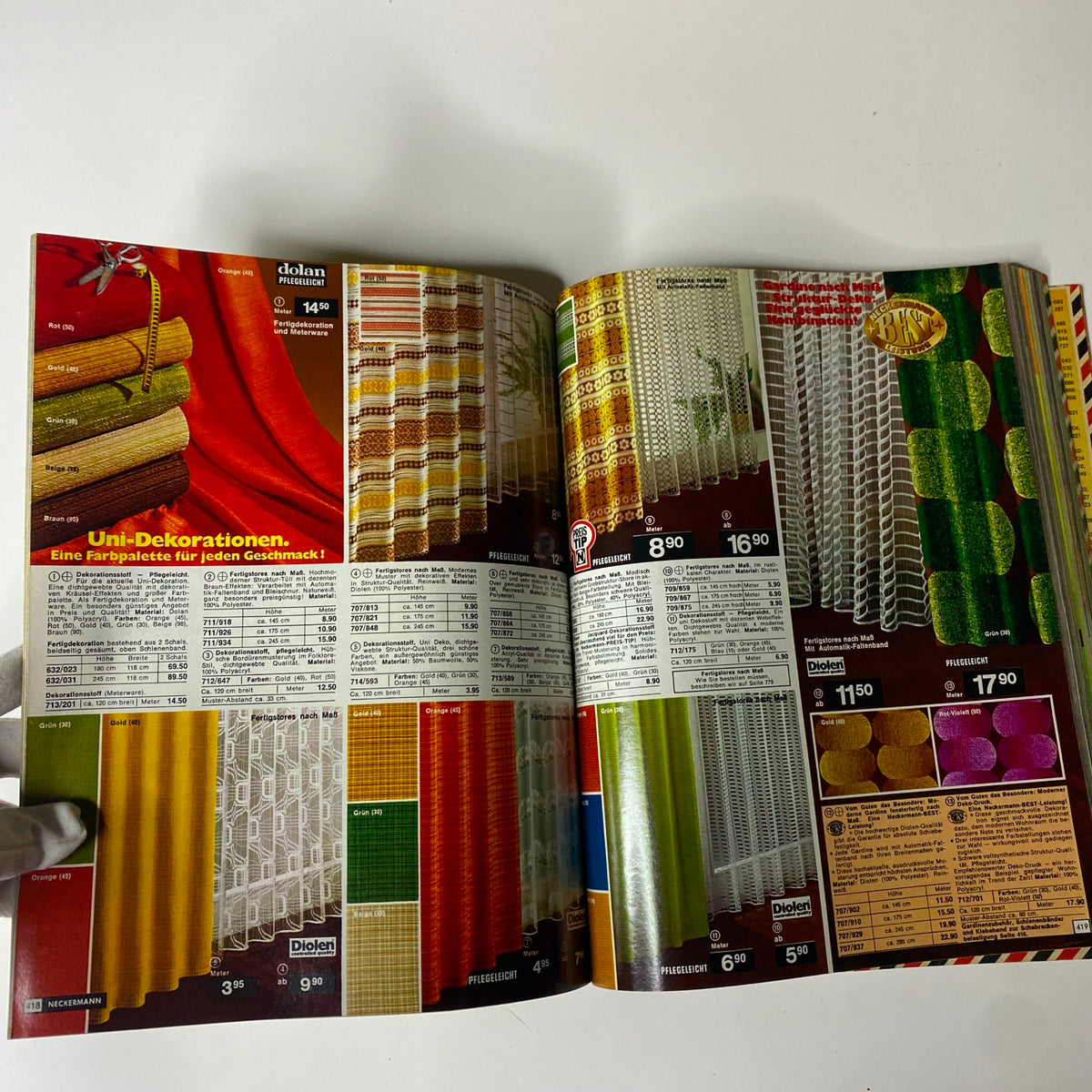 1976 Neckermann Summer Catalog displaying a variety of color swatches for home decoration fabrics, showcasing style options available in mid-1970s Germany.