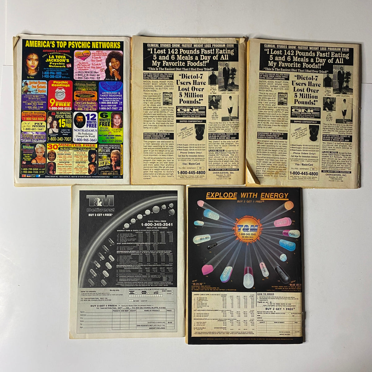 Rear covers of five vintage true crime magazines from the lot titled 'Lot of 5 1990s Headquarters Detective, True Detective Magazine and Yearbook'. Displays advertisements and promotional content typical of 1990s magazines, showcasing various products, services, and psychic networks.