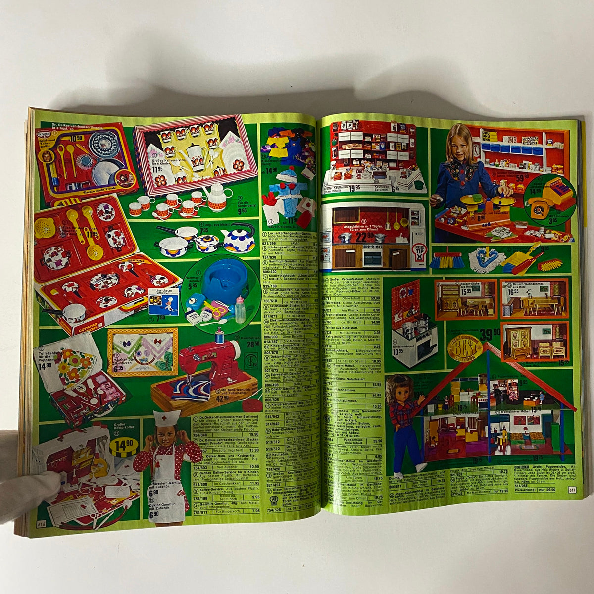 1974-1975 Neckermann Winter Catalog featuring a collection of children's playsets and accessories, designed for imaginative play with various toy items.