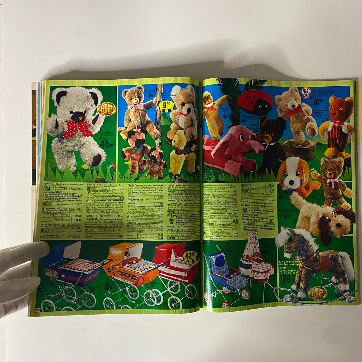 1974-1975 Neckermann Winter Catalog showcasing a variety of plush toys, including bears and other animals, on a vibrant green background.