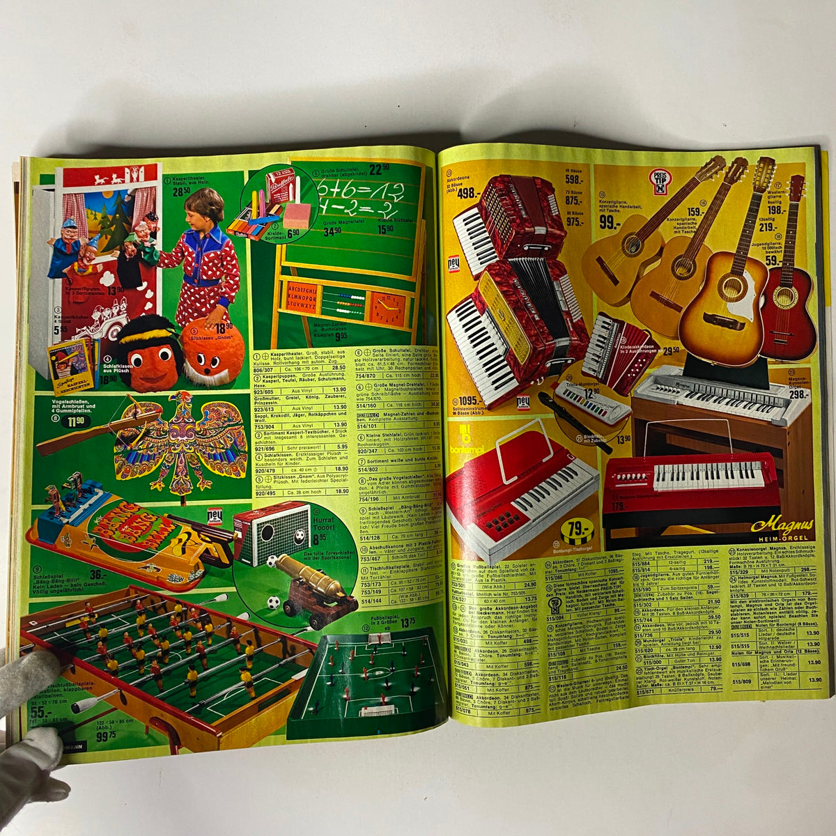 1974-1975 Neckermann Winter Catalog displaying musical instruments and educational toys, including keyboards, guitars, and games.