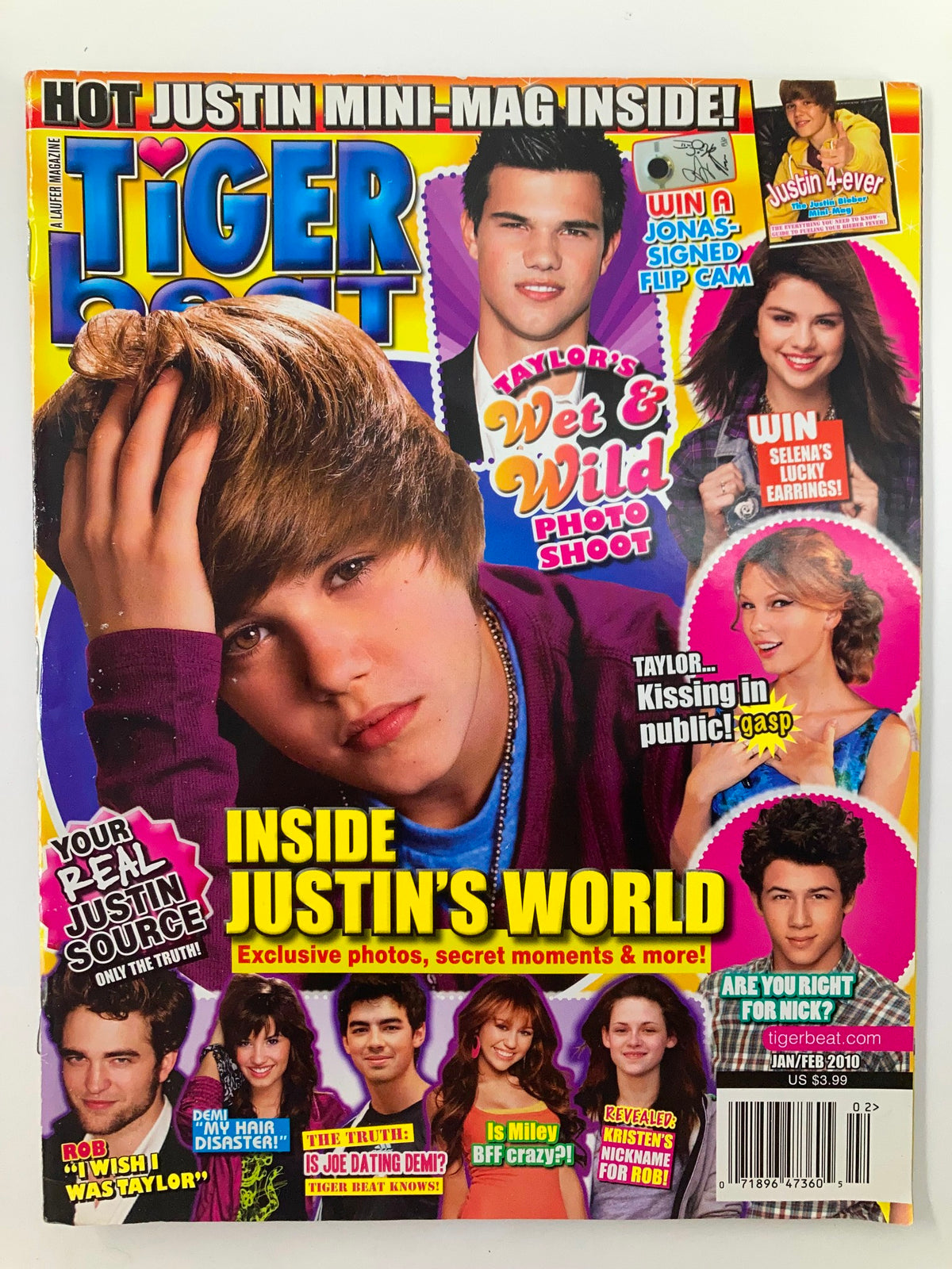 Cover of Tiger Beat Magazine January 2010 Vol 8 #1 featuring Justin Bieber. The magazine includes sections on Justin's life, Taylor Swift's photo shoot, and celebrity gossip. Acceptable condition, newsstand edition, comes with plastic protective covering.