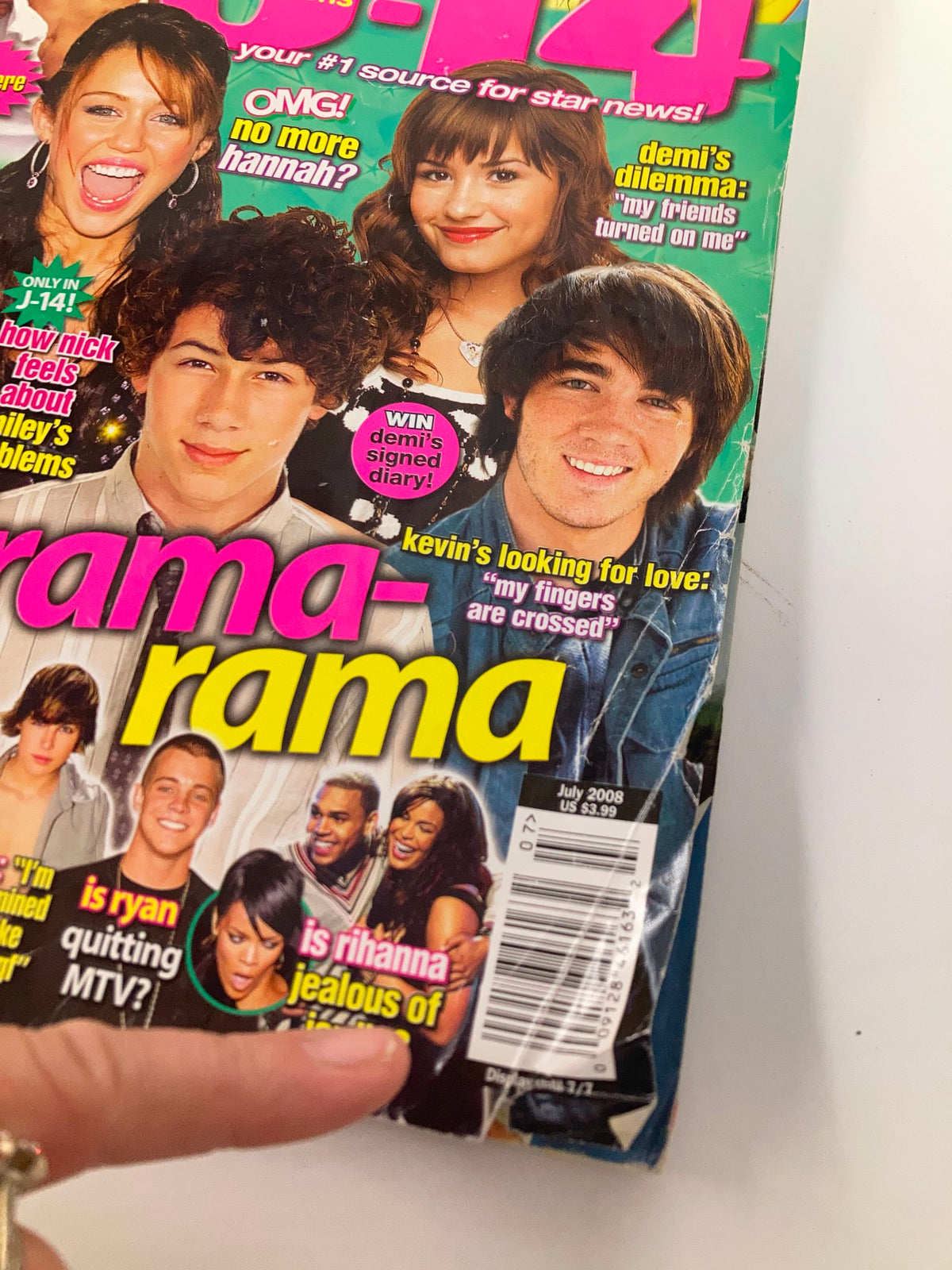 Cover of Just 4-Teens Magazine July 2008 featuring Nick Jonas, Miley Cyrus, and Demi Lovato with vibrant colors and headlines about teen celebrity news.