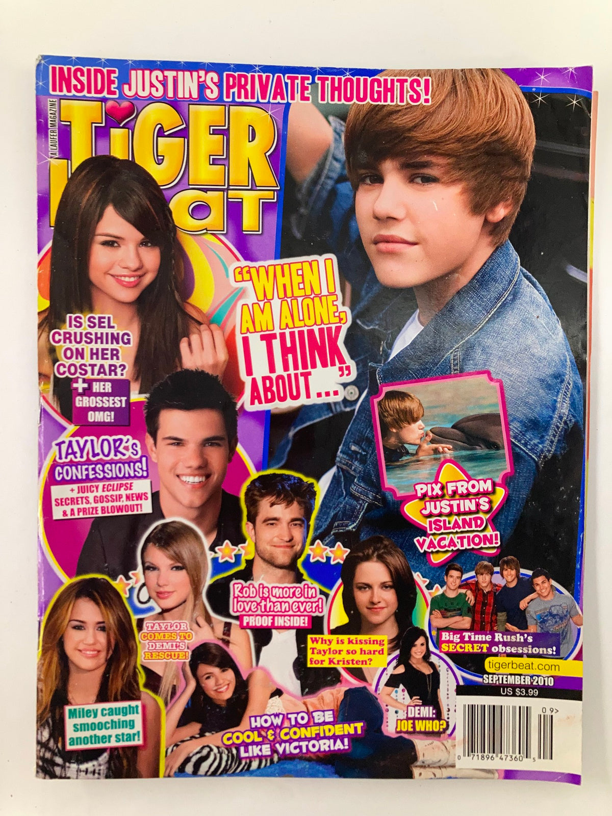 Cover of Tiger Beat Magazine September 2010 featuring Justin Bieber, Selena Gomez, and Taylor Lautner. The cover includes a quote about private thoughts and reveals exciting features such as vacation pictures and secrets from stars, making it a must-have collectible for fans.