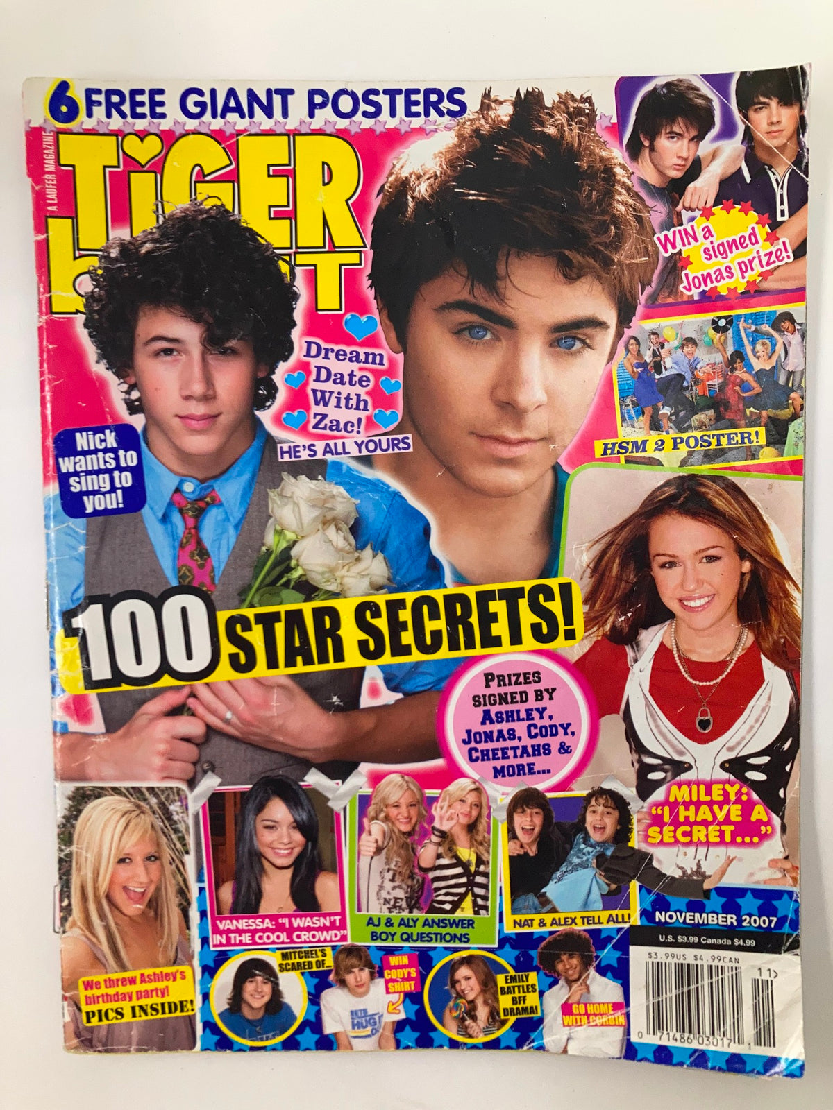 Cover of Tiger Beat Magazine November 2007 featuring Nick Jonas, Zac Efron, and Miley Cyrus with text highlighting 100 star secrets and dream date with Zac.