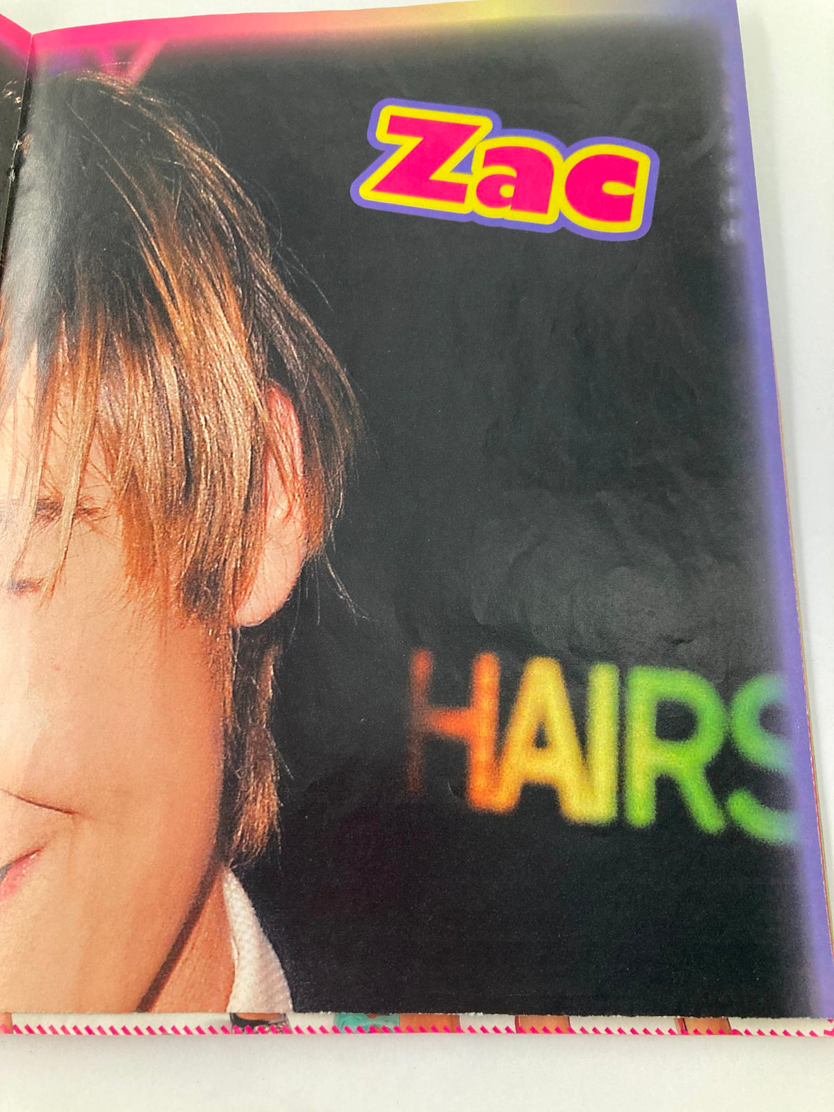 Close-up of Zac Efron feature from Tiger Beat Magazine October 2007, showcasing his hairstyle and charm.