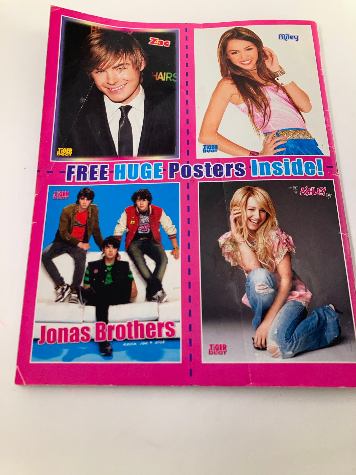 Cover page of Tiger Beat Magazine October 2007, featuring Zac Efron, Miley Cyrus, Jonas Brothers, and Ashley Tisdale with promotional text for free posters.