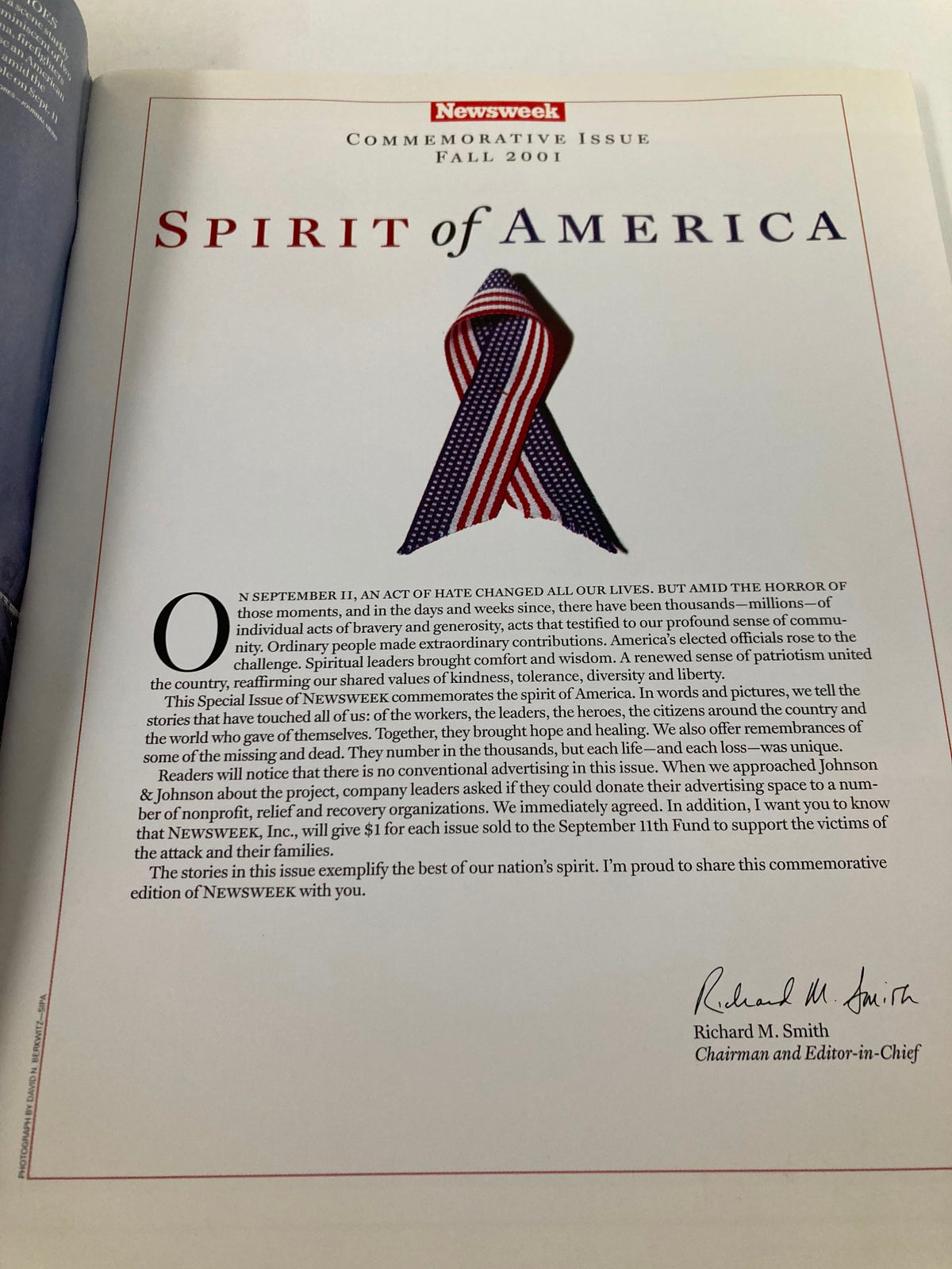 Newsweek Magazine Fall 2001 The Spirit of America, commemorative issue cover featuring a patriotic ribbon, reflecting on the aftermath of the September 11 attacks.