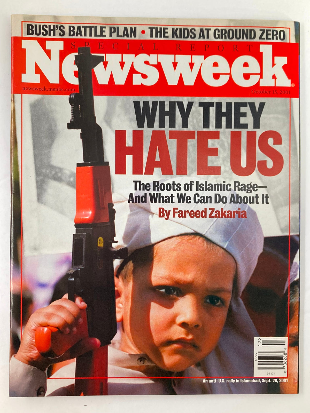 Cover of Newsweek Magazine, October 15, 2001, titled 'The Roots of Islamic Rage', featuring a child holding an AK-47, symbolizing the urgency of global conflict post-9/11.