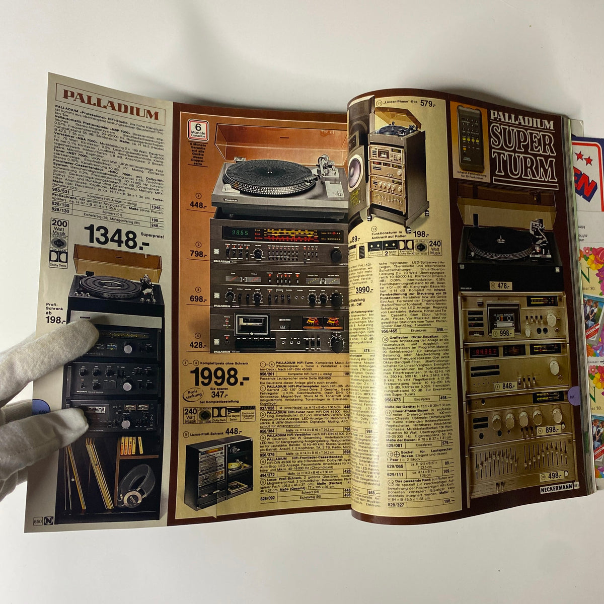 Another page from the 1980 Neckermann Summer Catalog featuring high-fidelity audio equipment, including turntables and stereo systems, reflecting the vintage audio styles of the era.