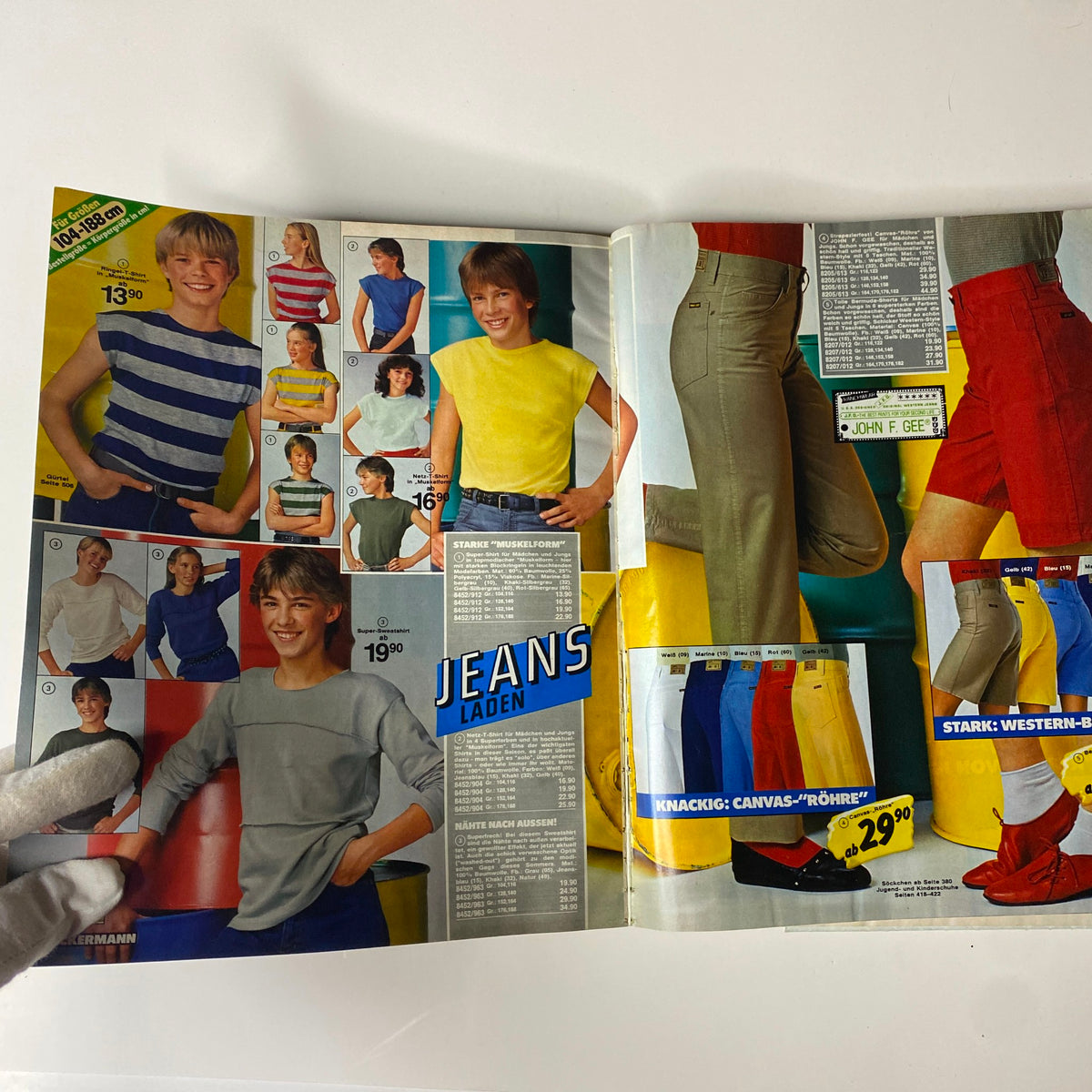 1984 Neckermann Summer Catalog featuring a range of children's and youth casual clothing, focusing on vibrant colors and playful styles typical of 1980s fashion.
