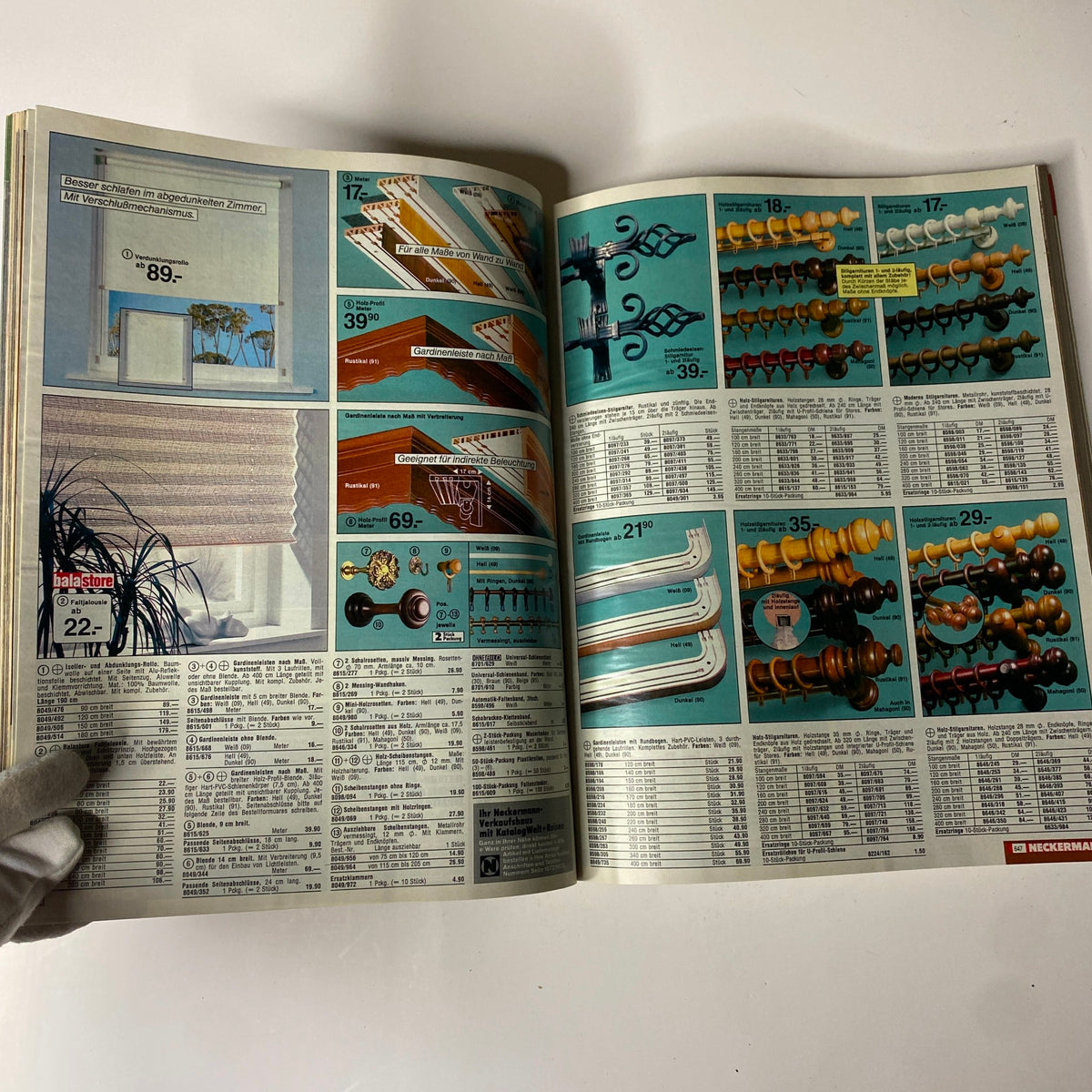 Page from the 1985 Neckermann Summer Catalog displaying various home goods such as curtain rods and window shades, typical of mid-1980s decor.