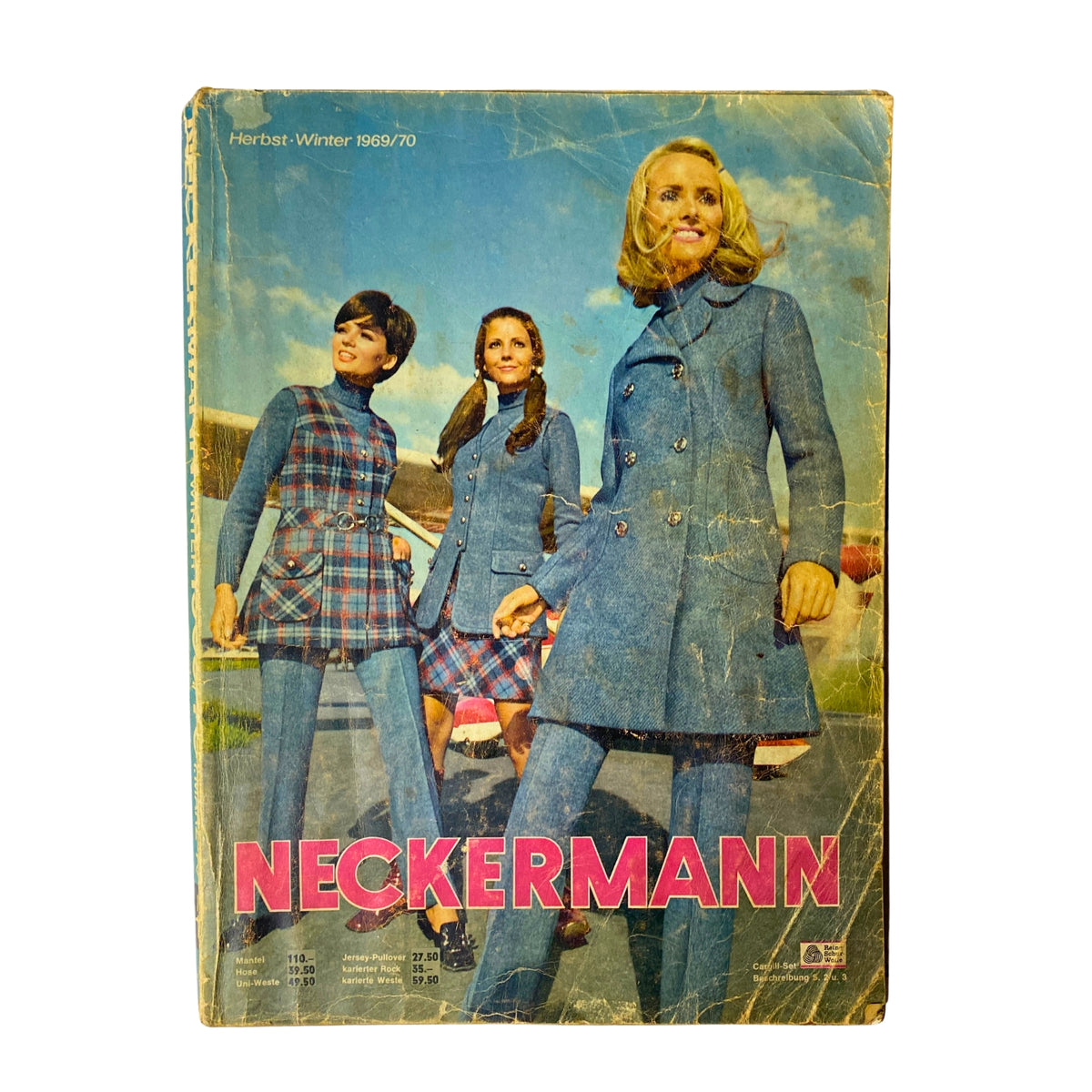 1969-1970 Neckermann Winter Catalog cover featuring three women modeling stylish winter outfits. The cover showcases the retro fashion of the late 1960s in a vibrant setting.
