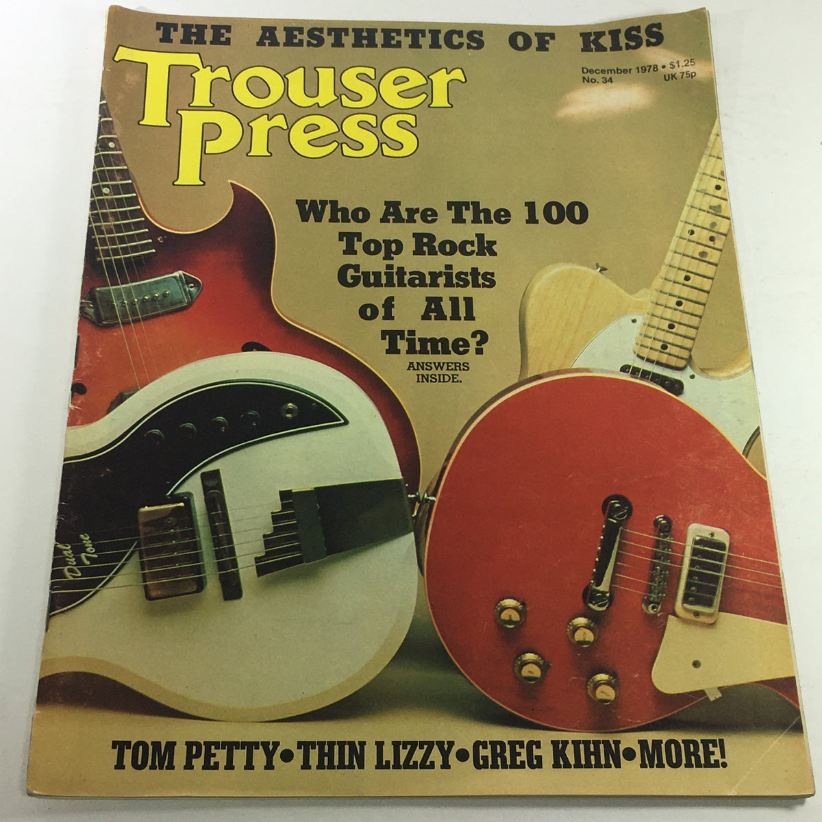 VTG Trouser Press Magazine: December 1978 cover featuring guitars and text highlighting artists Tom Petty, Thin Lizzy, and Greg Kihn, showcasing the aesthetics of rock music.