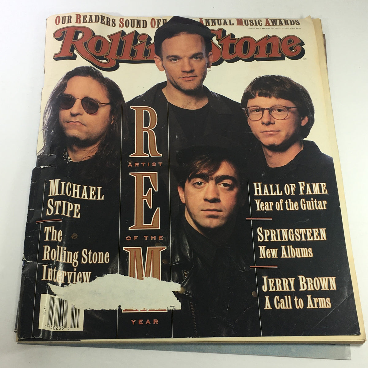 Rolling Stone Magazine cover from March 5, 1992, featuring R.E.M., Michael Stipe, and Jerry Brown, highlighting the artist of the year theme with interviews and cultural commentary.