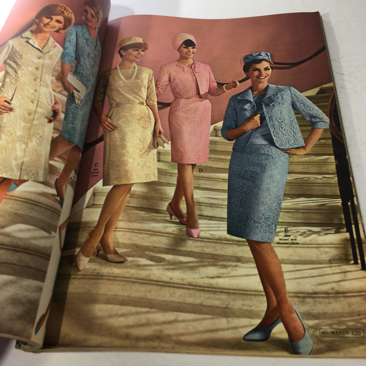 Inside the VTG Montgomery Ward catalog: Fall & Winter 1966 showcasing a collection of elegant dresses. Three models pose in various pastel-colored outfits, highlighting mid-century women's fashion.