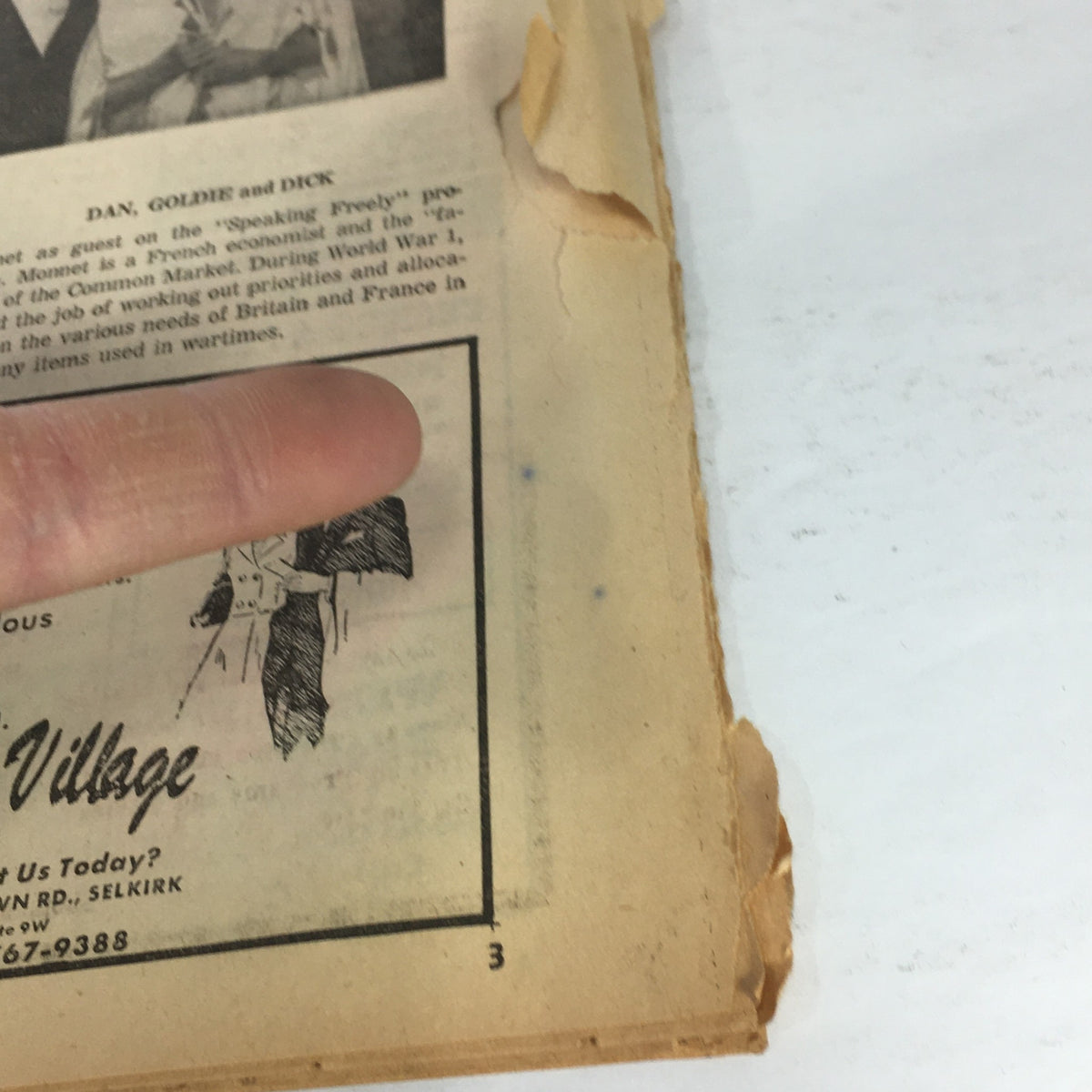 Inner page of the VTG TV Capital Newspapers with an advertisement and partially shown hand pointing, indicative of wear, dated September 26-October 3 1979.