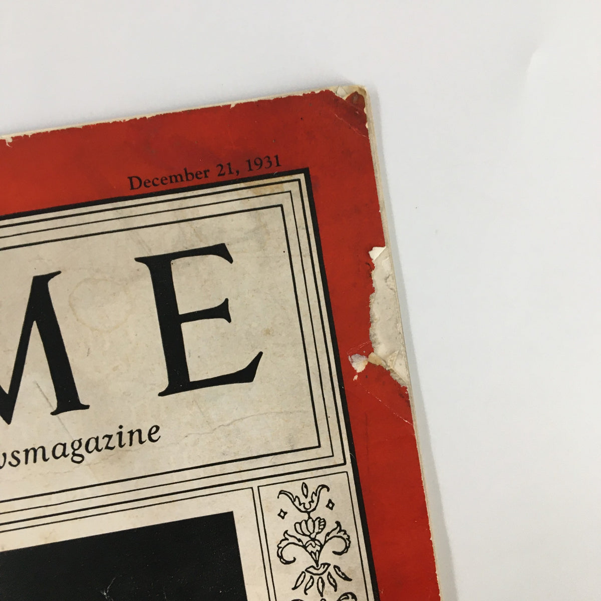 Close-up of the top corner of Vintage Time Magazine from December 21, 1931, highlighting the magazine's title and age-related wear.