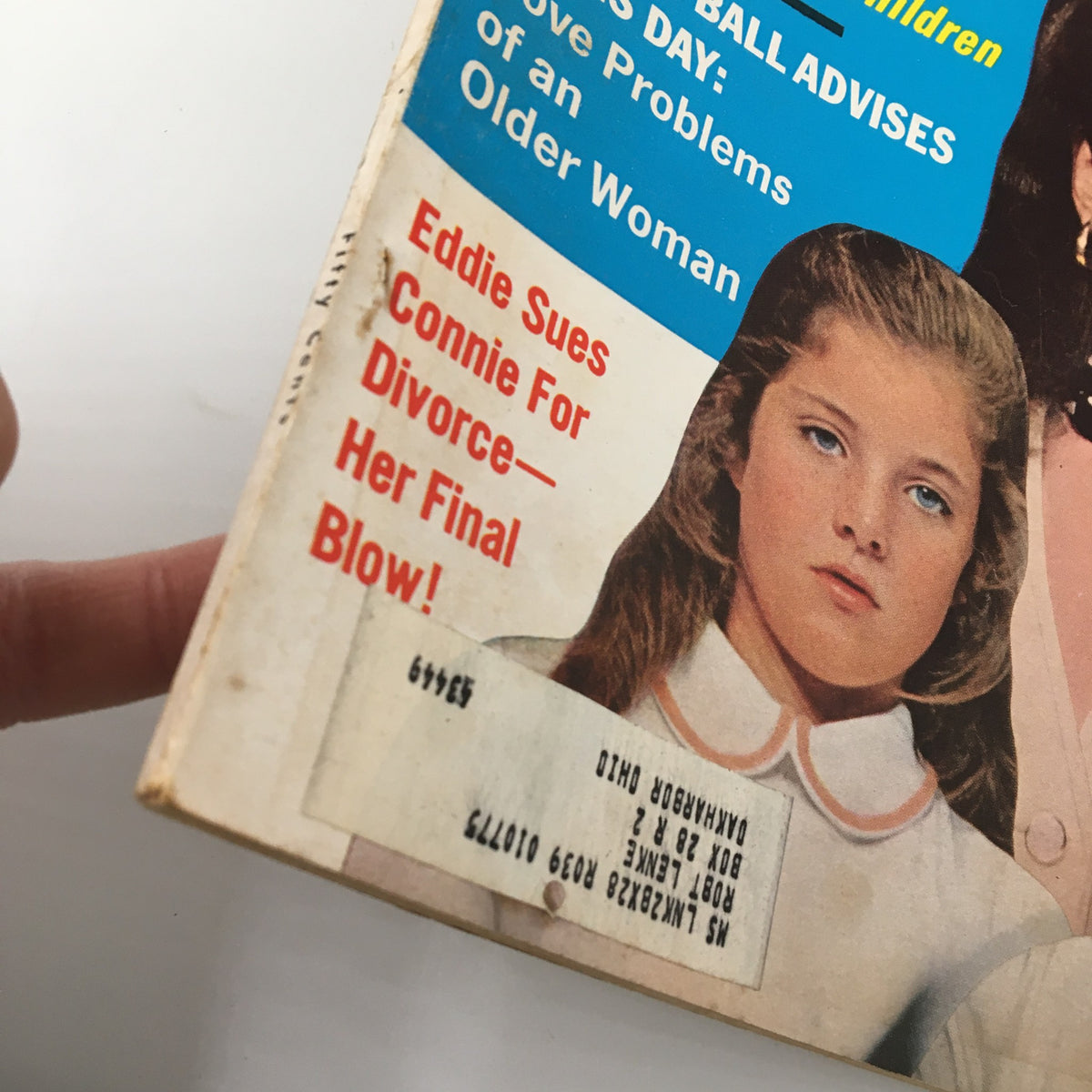 Close-up of the cover of VTG Modern Screen Magazine July 1969, showing Jackie Kennedy, Caroline, and John F. Kennedy along with eye-catching headlines related to the era.