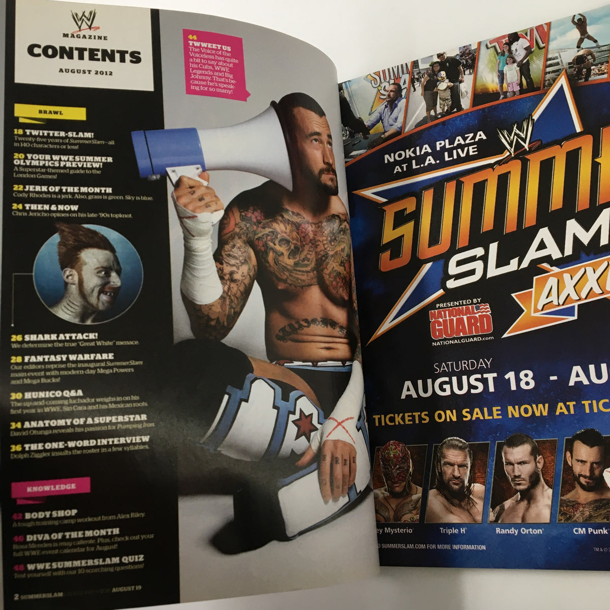 Inside page of WWE Magazine August 2012 showcasing CM Punk along with contents for the magazine, including articles on wrestling superstars and events.