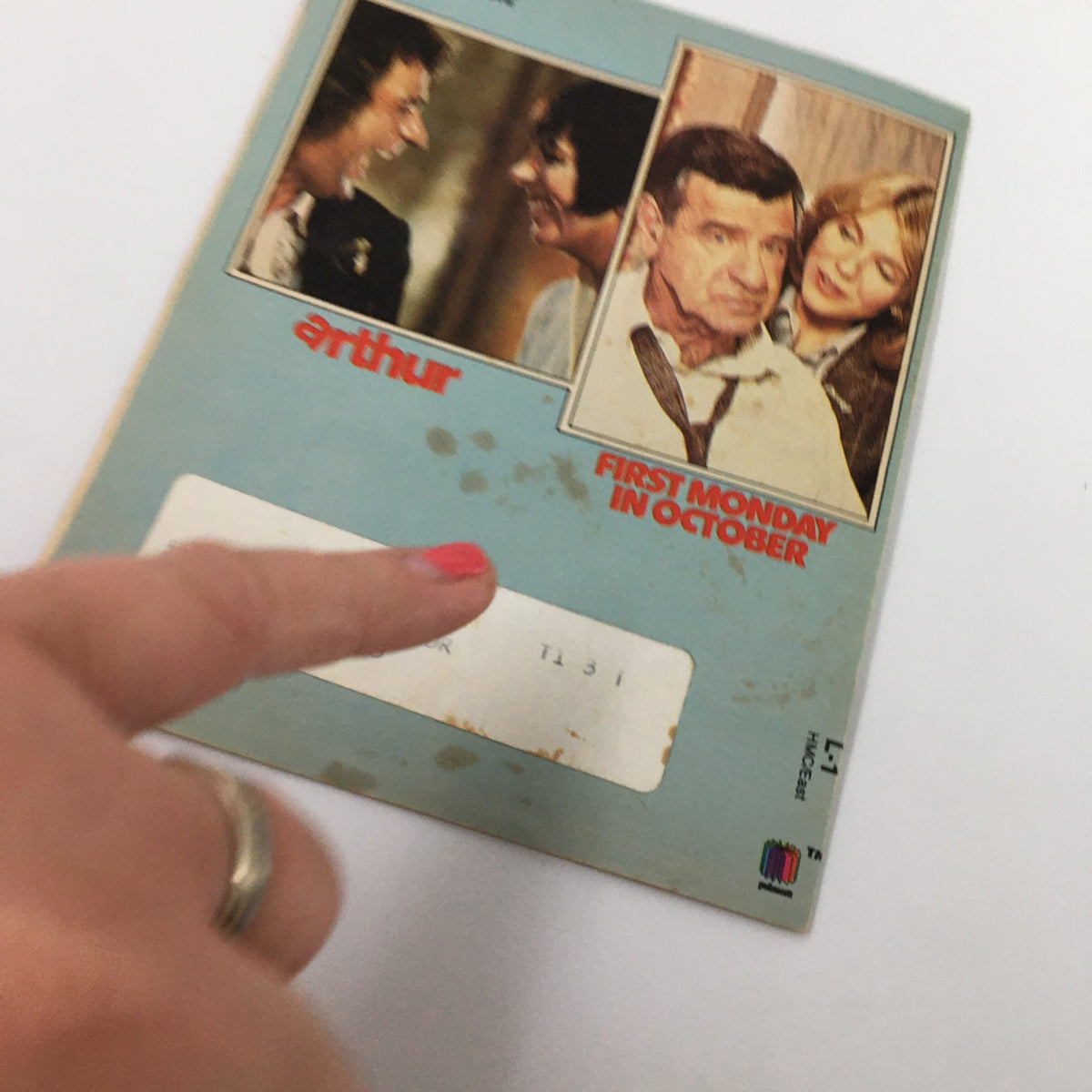 Cover of the VTG Premium Channels Mini Magazine from September 1982 featuring Faye Dunaway in Mommie Dearest, showcasing scenes from First Monday in October, with visible wear and a finger pointing at a label.