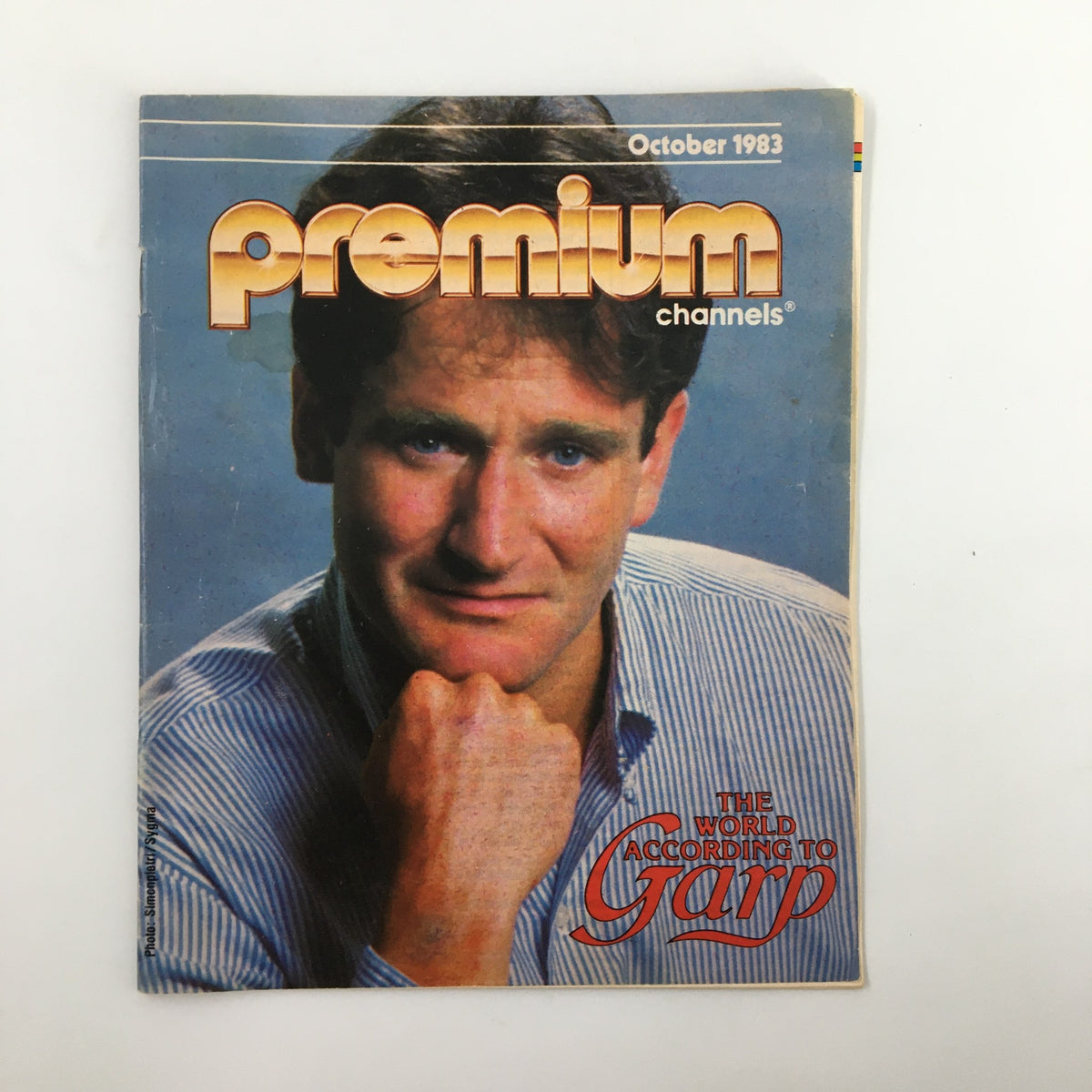 Cover of the VTG Premium Channels Mini Magazine October 1983 featuring Robin Williams as T.S. Garp, showcasing his iconic look and style.