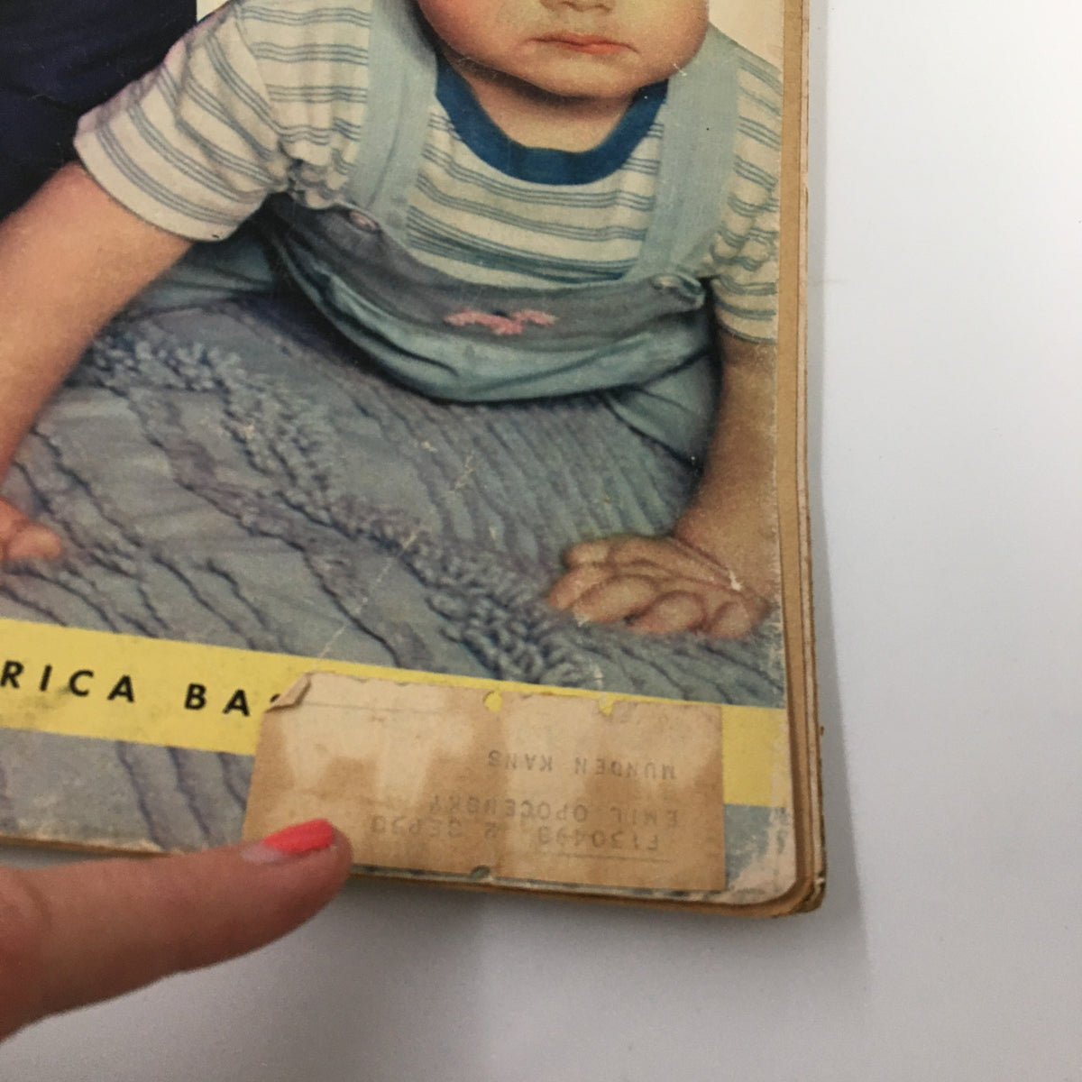 Close-up image of the VTG Look Magazine from October 10, 1950 showing a label and details featuring a child in a striped outfit, highlighting magazine condition and age.