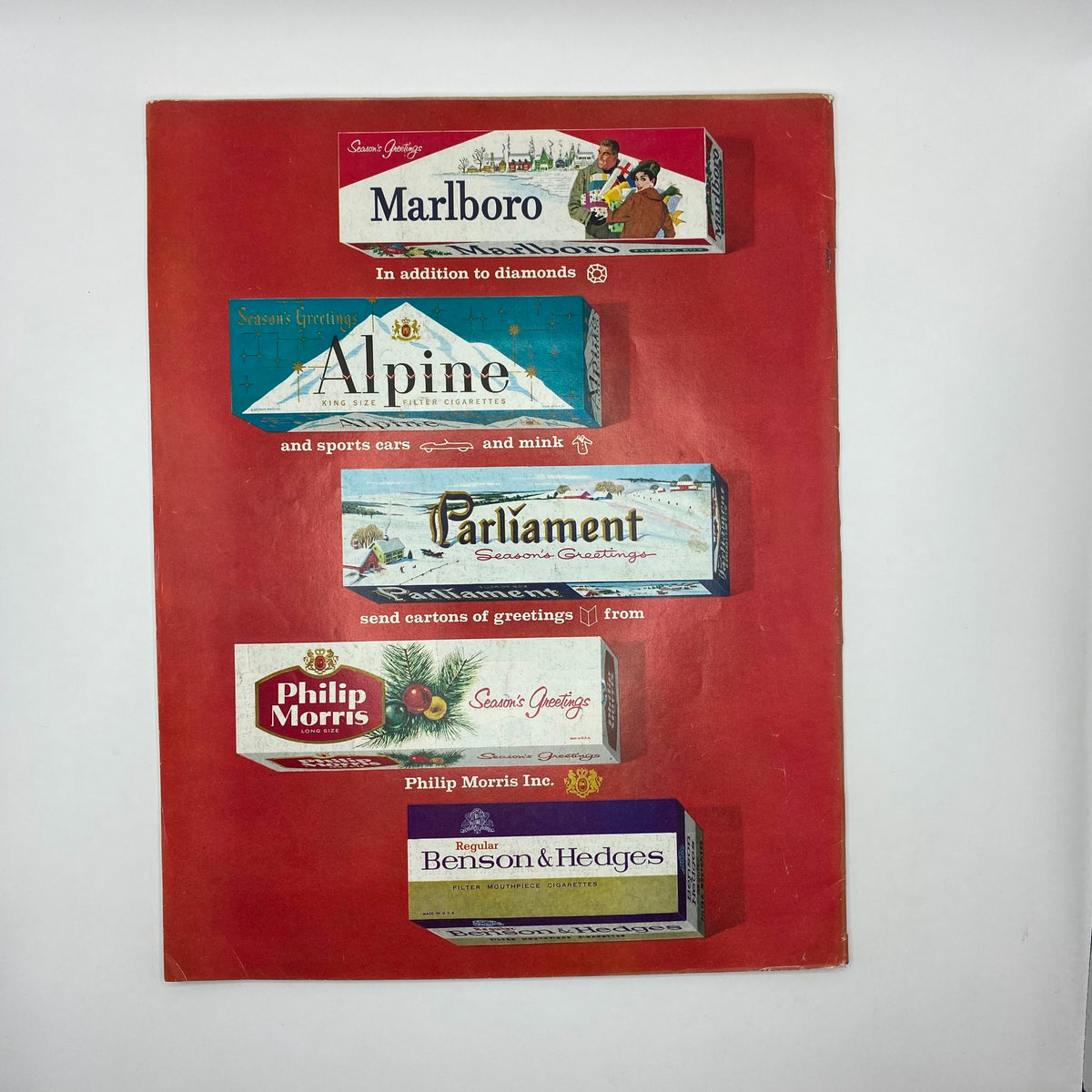 Back cover of the Saturday Evening Post Magazine from December 12, 1959, displaying vintage cigarette advertisements, highlighting cultural trends and products from that era.