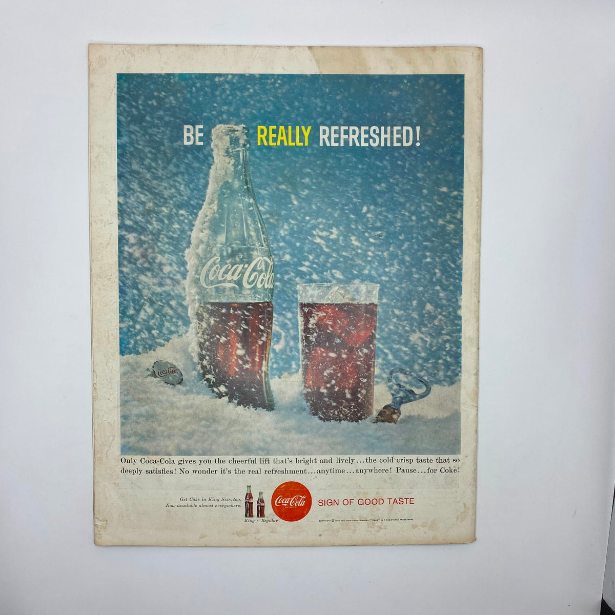 Advertisement in Saturday Evening Post Magazine August 1 1959 for Coca-Cola, featuring an ice-cold bottle and glass of Coke with a refreshing backdrop, promoting the drink as the ultimate refreshment.