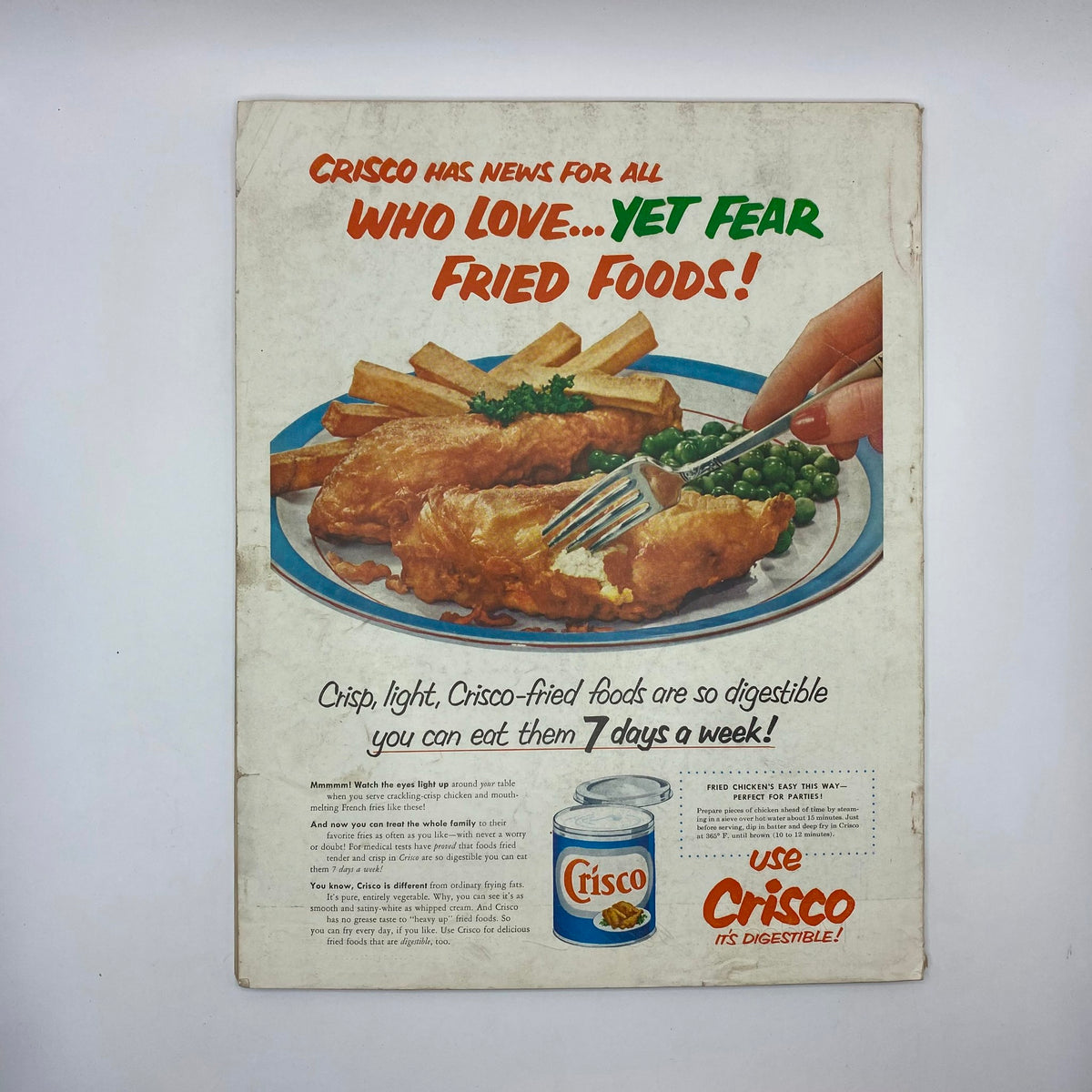 Advertisement page from VTG McCall's Magazine November 1954 promoting Crisco cooking oil, featuring a plate of fried fish and fries.