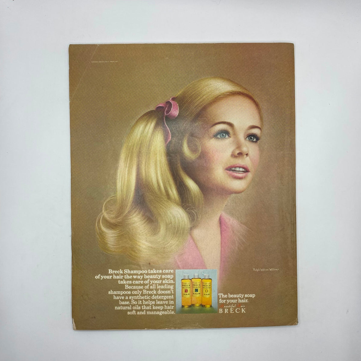 Back cover of VTG McCall's Magazine September 1968, showcasing an advertisement for Breck Shampoo with a model displaying beautiful hair, emphasizing hair care linked to beauty.