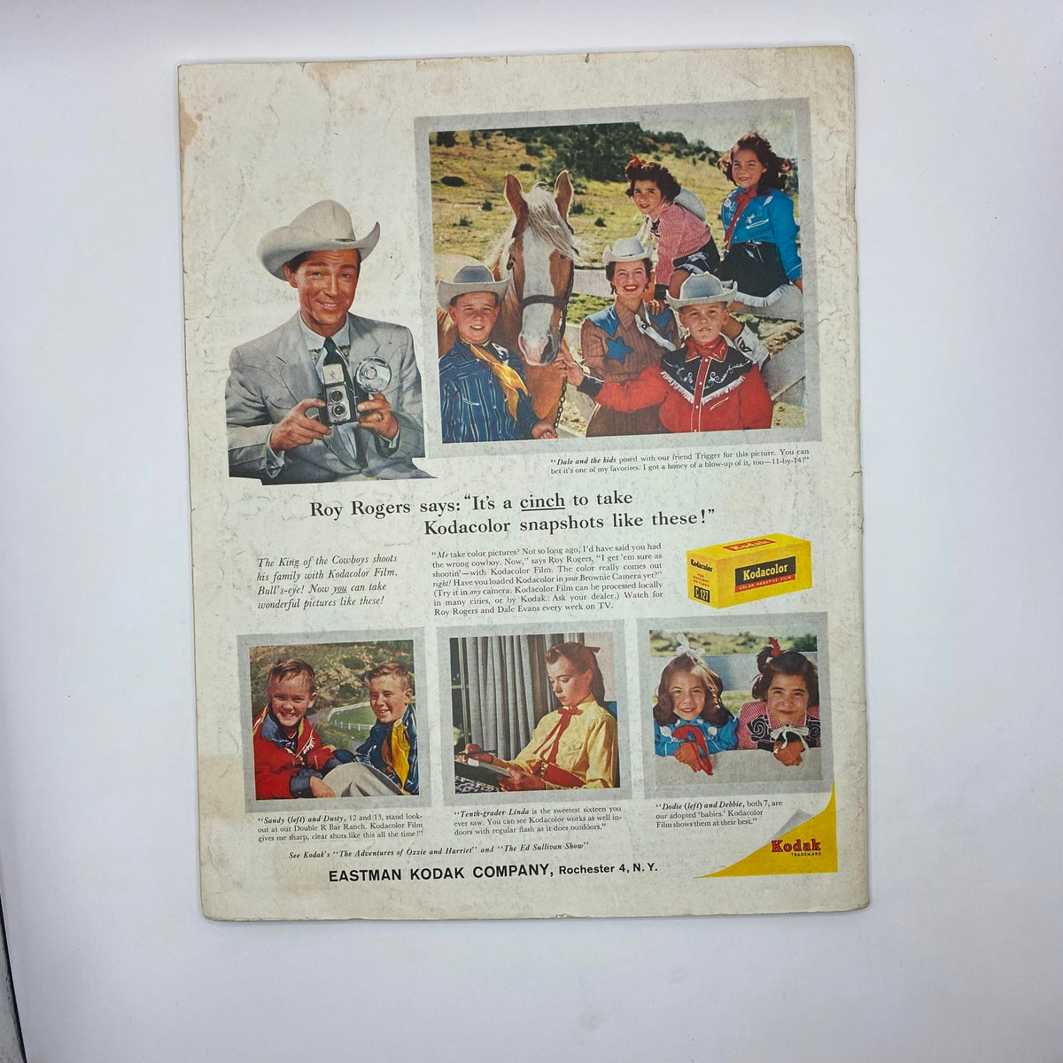 Back cover of the Saturday Evening Post Magazine, September 19, 1959, with an advertisement featuring Roy Rogers promoting Kodacolor film, highlighting vintage lifestyle and photography trends.