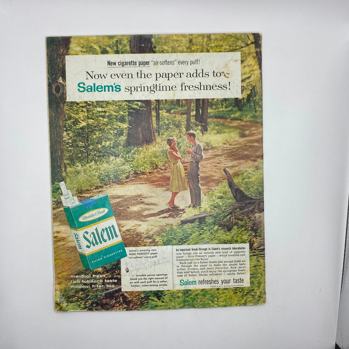 Back cover of the Saturday Evening Post Magazine December 19, 1959 featuring an advertisement for Salem cigarettes with a couple in a scenic outdoor setting.
