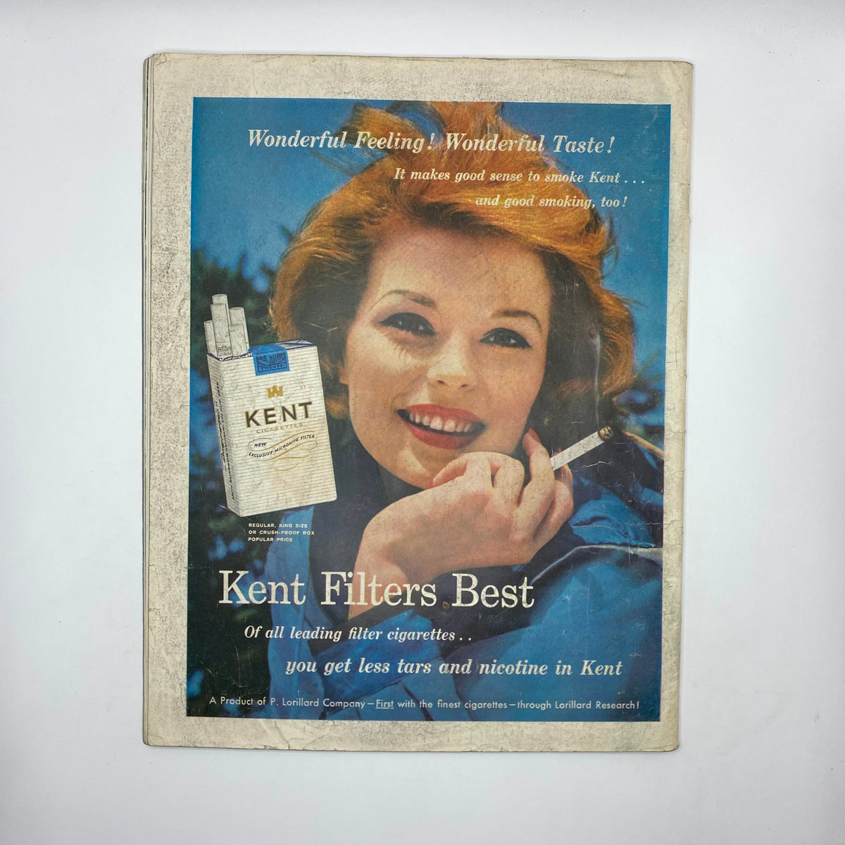 Vintage advertisement for Kent cigarettes on the back cover of Saturday Evening Post Magazine, March 7, 1959, highlighting the tagline 'Wonderful Feeling - Wonderful Taste'.