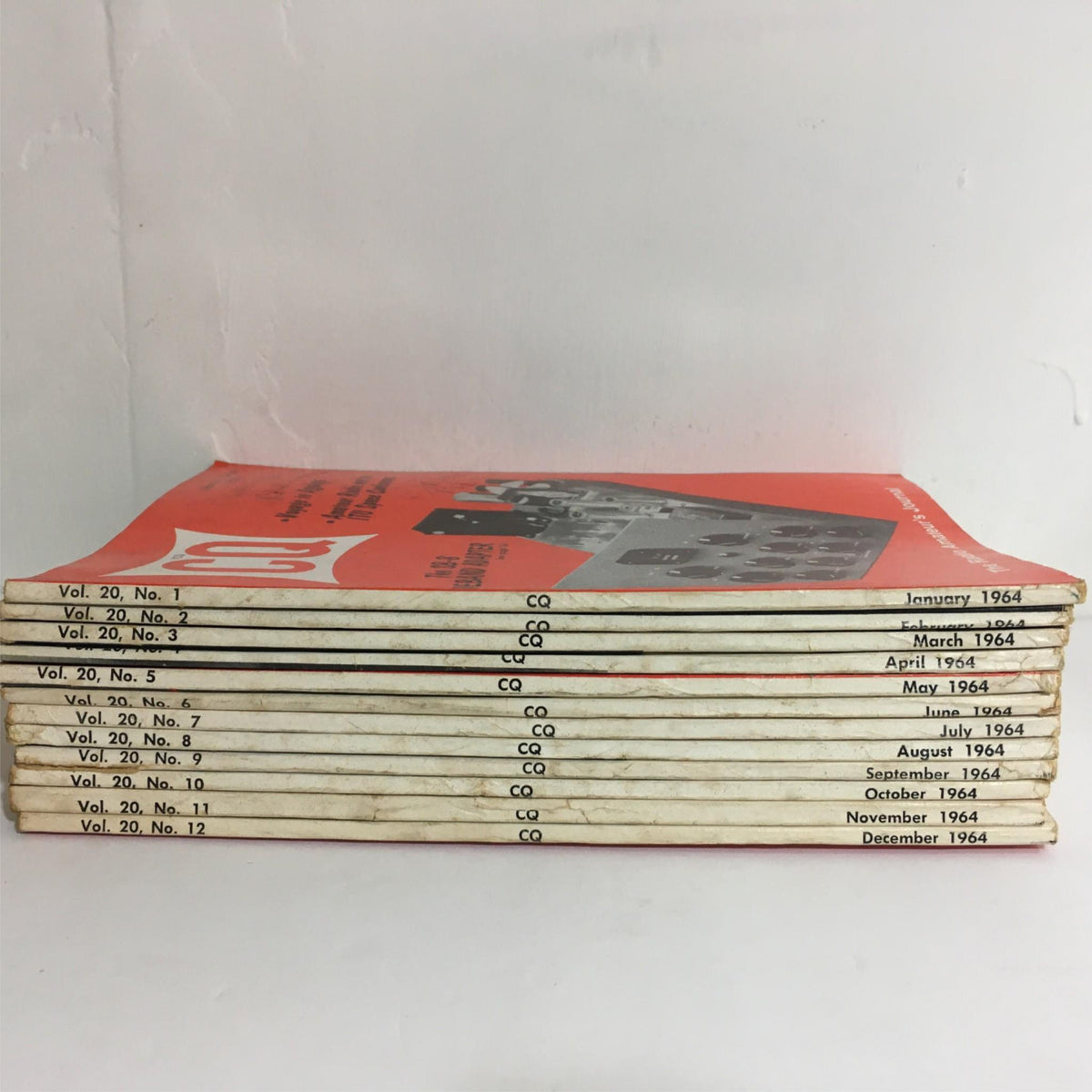 Stack of CQ The Radio Amateur's Journal issues from 1964, displaying the complete collection from January to December, highlighting the evolution of amateur radio insights.