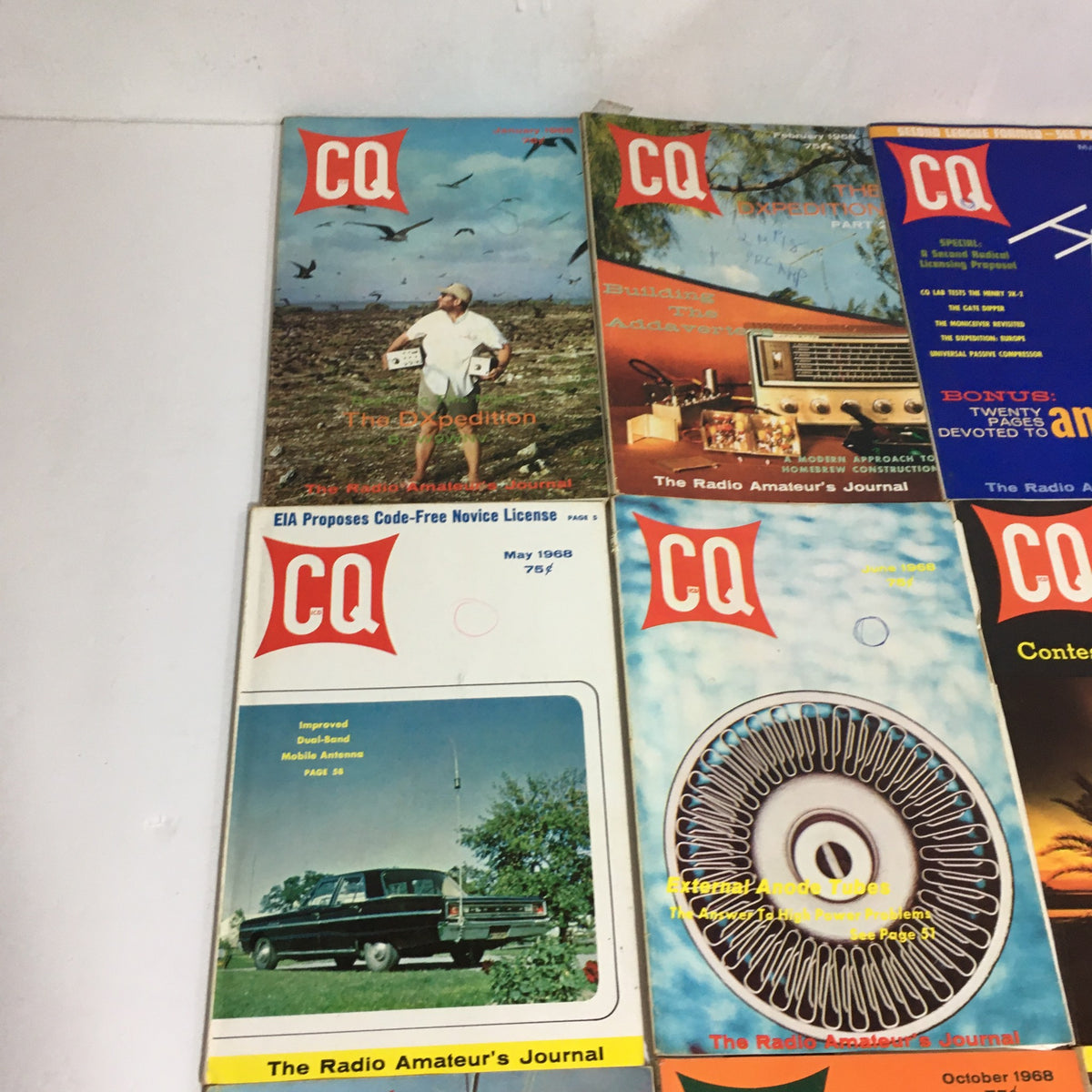 Close-up of several covers from the Lot of 12 Complete January to December 1968 CQ The Radio Amateur's Journal, highlighting titles and images pertinent to amateur radio.