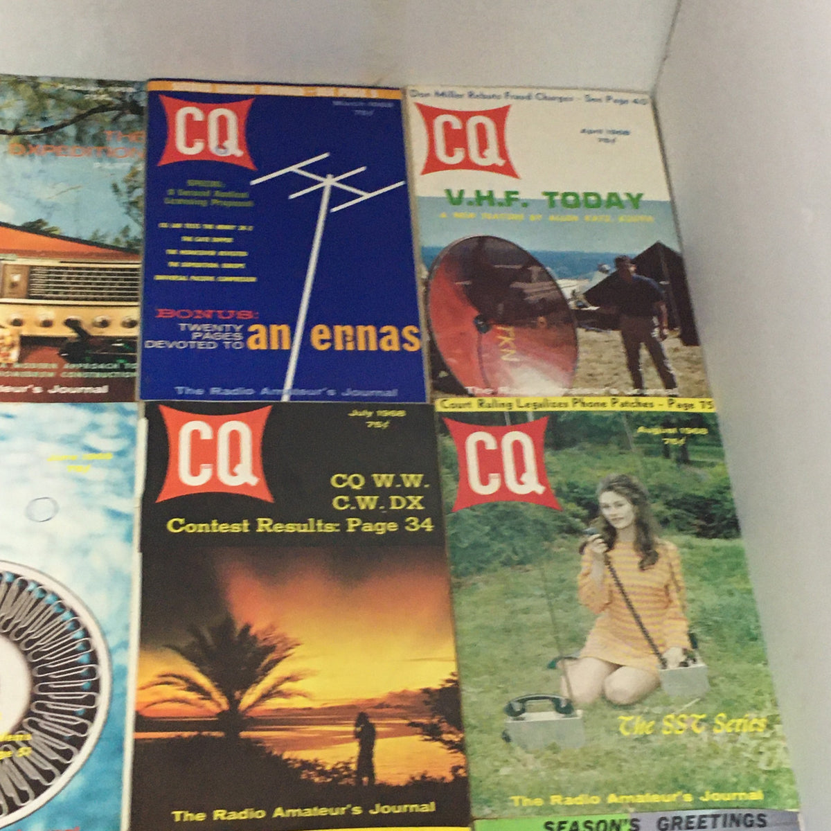 Detailed view of various CQ The Radio Amateur's Journal covers from the Lot of 12 Complete January to December 1968, focusing on content related to radio technology and community.