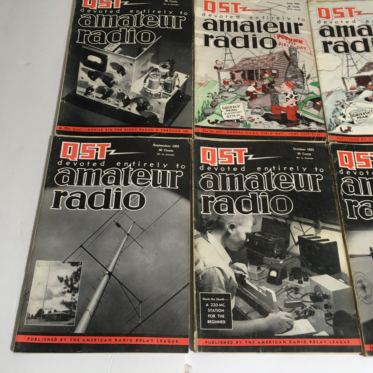 Lot of 12 Complete January to December 1953 QST Amateur Radio magazines with covers highlighting articles from September to October 1953.
