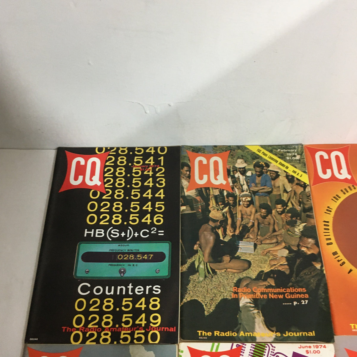 Lot of 12 Complete January to December 1974 CQ The Radio Amateur's Journal featuring the covers of January, February, and March 1974 editions, showcasing various radio communication themes.
