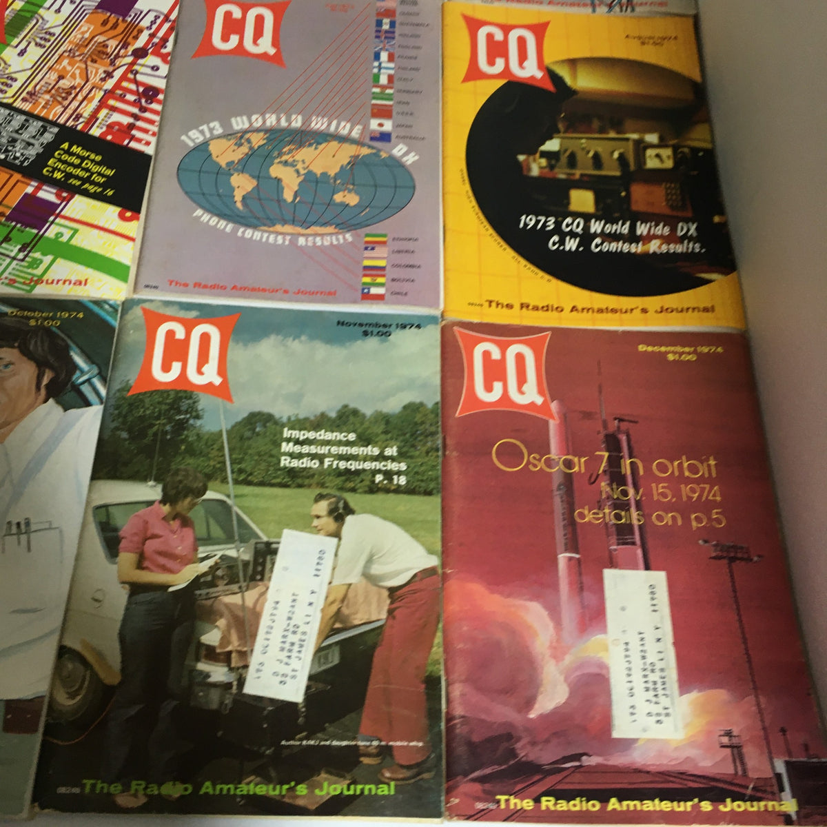 Lot of 12 Complete January to December 1974 CQ The Radio Amateur's Journal, featuring magazine covers from October, November, and December 1974 highlighting radio amateur topics and features.